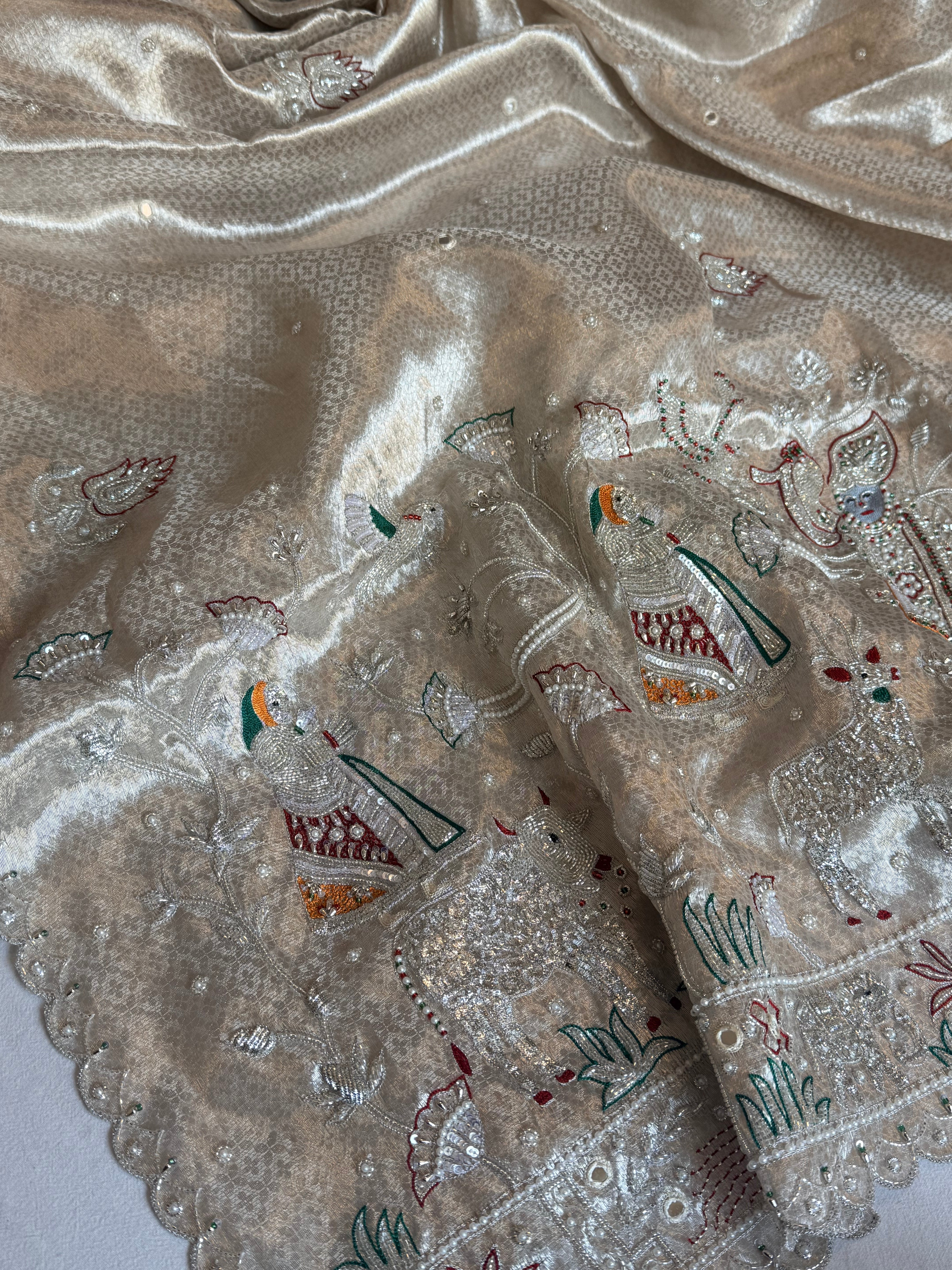 Chandi silver tissue brocade shrinathji motif inspired kadhwa hand embroidered saree