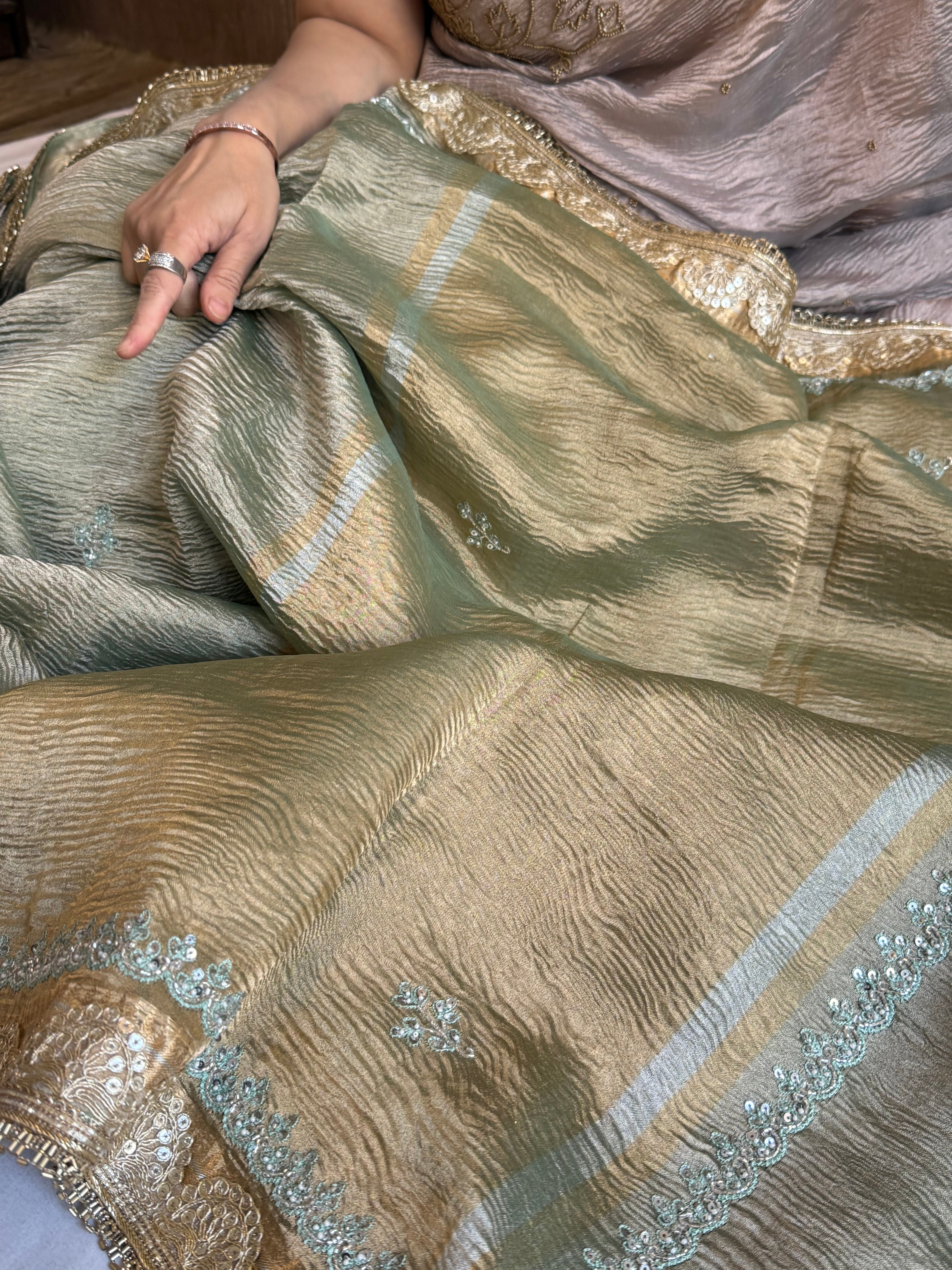 Sage green pearl work hand embroidered husn crushed tissue saree