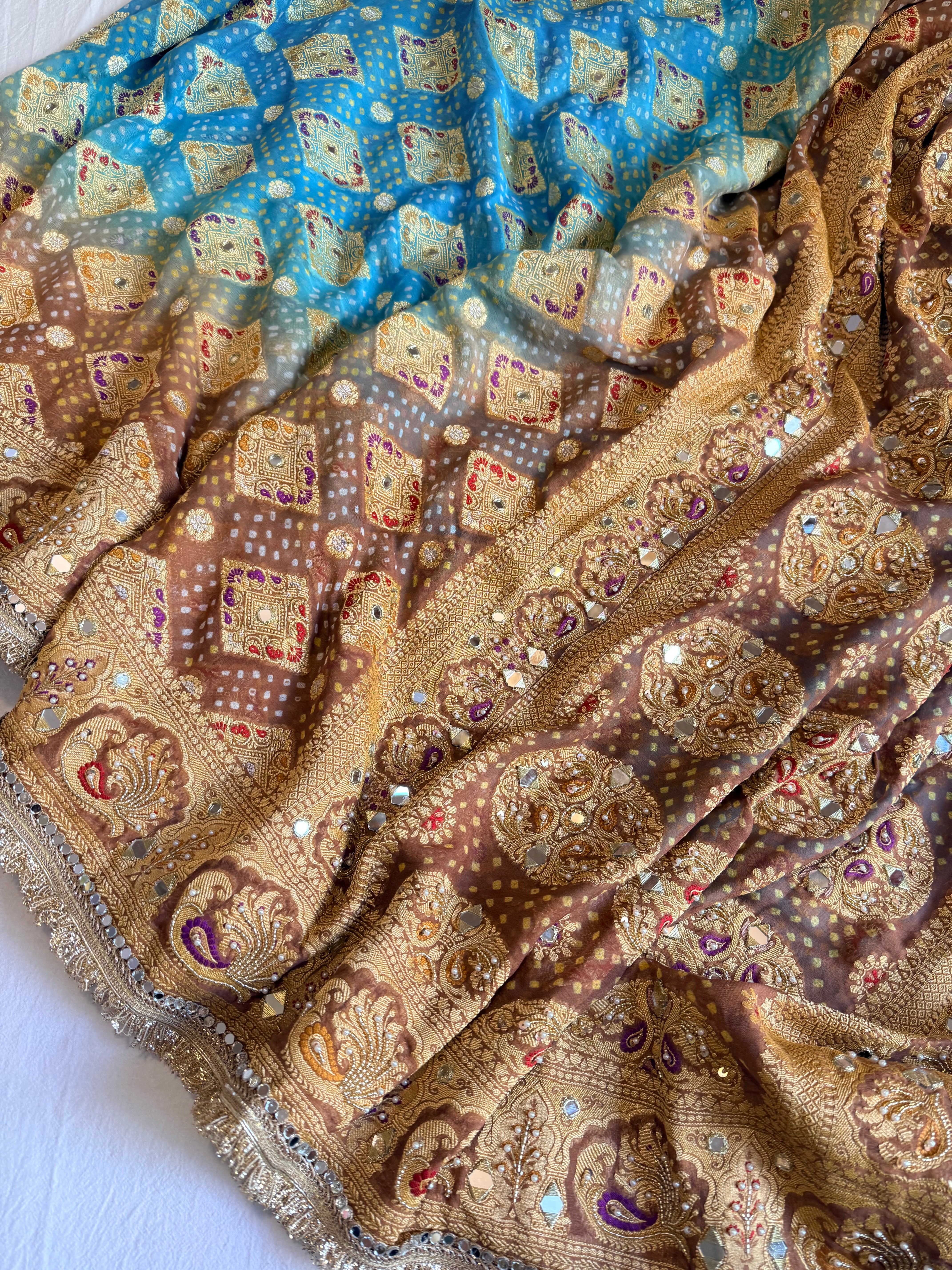 Banarasi blush shades of chiffon rai bandhej mirror work hand embroidered saree