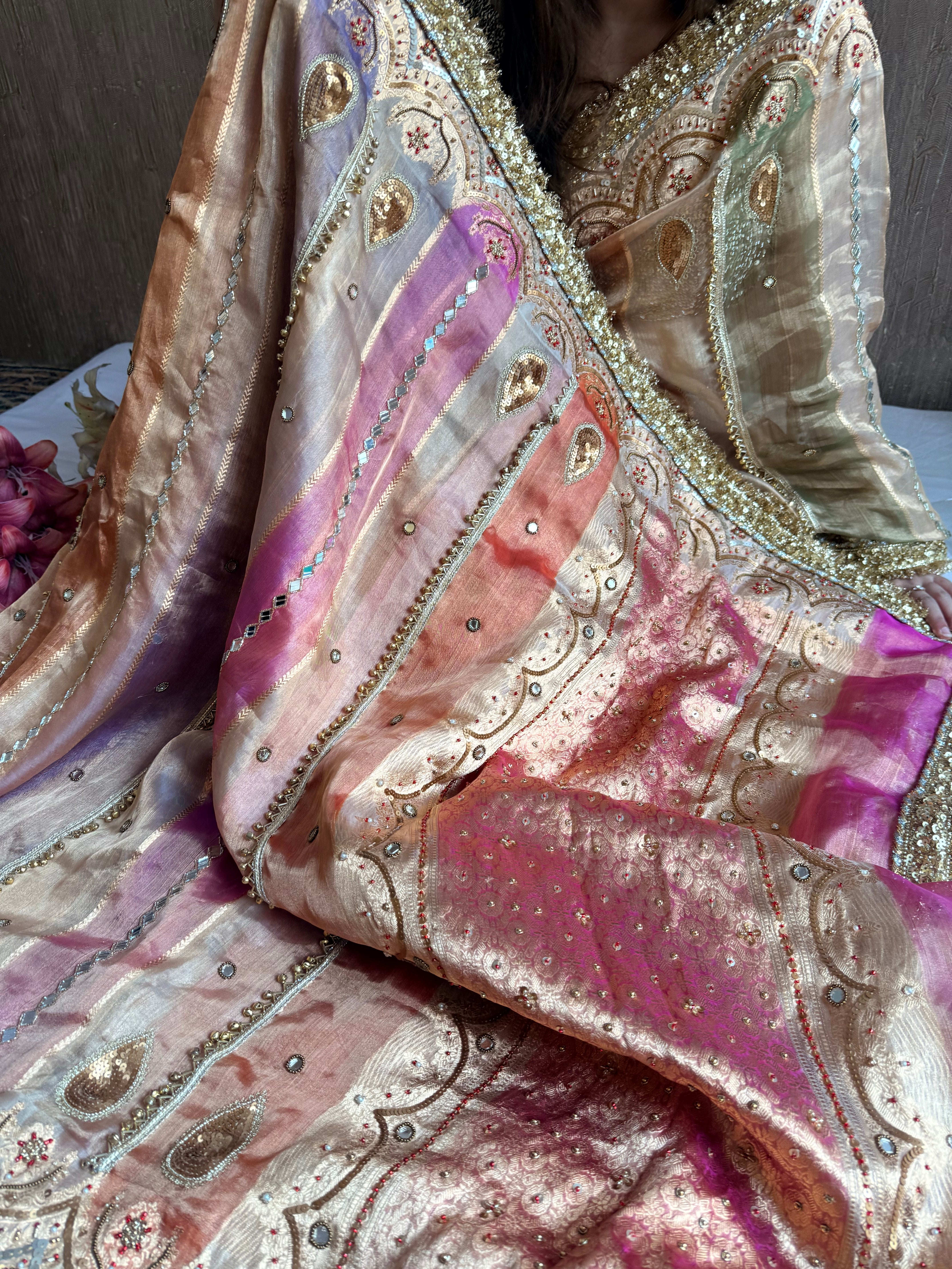 Navratan edit tissue silk rangkaat and ghungroo work hand embroidered saree