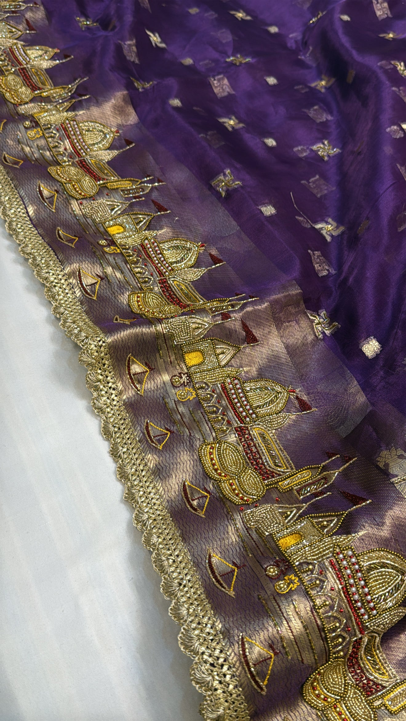 Gangaghat edit midnight purple hand embroidered tissue silk saree
