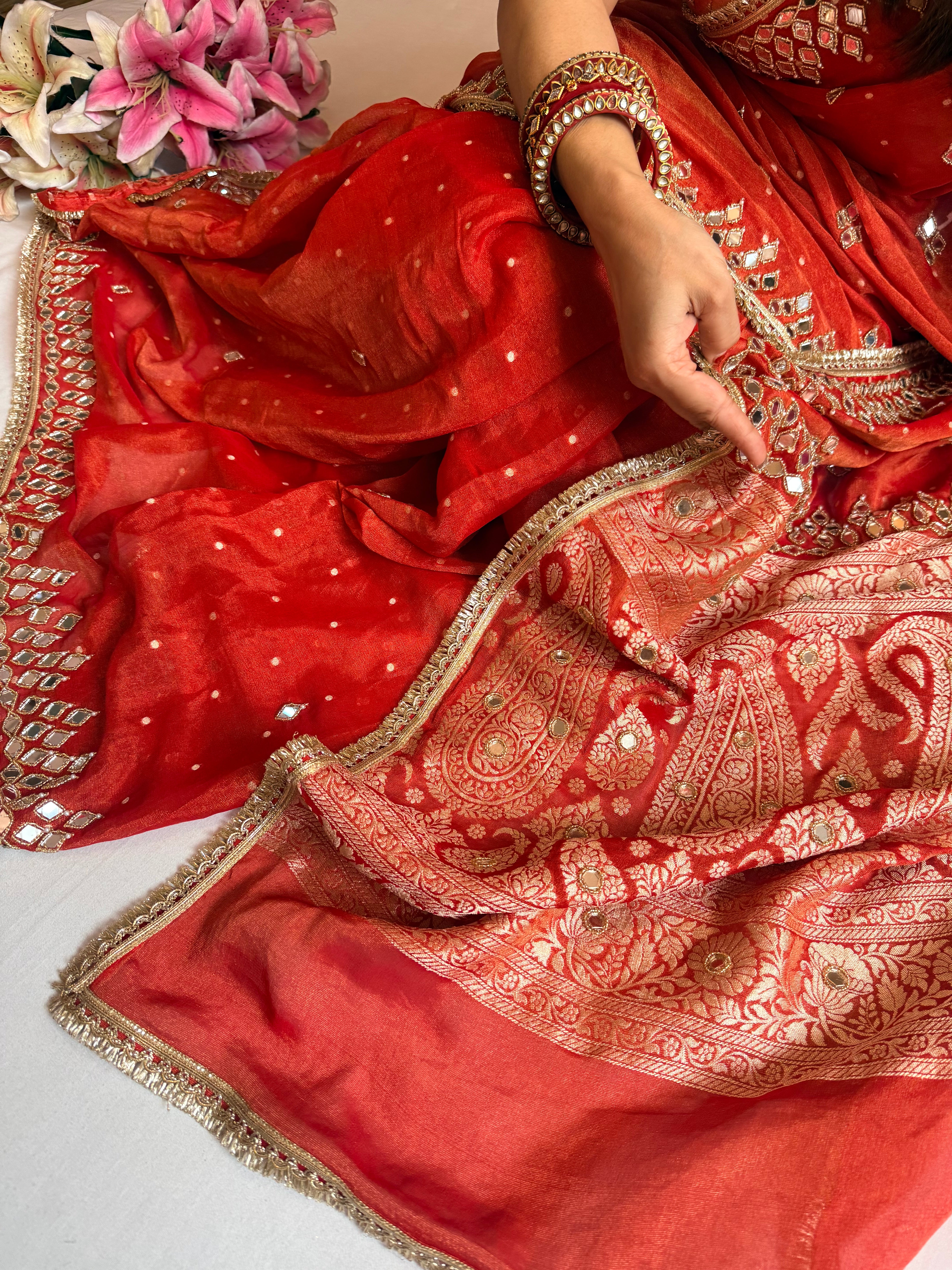 Rust red tissue gorgette mirror work hand embroidered saree
