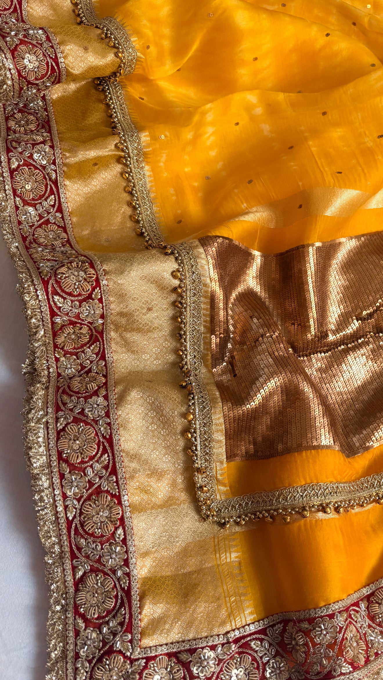 Chan Chan ghungroo haldi yellow work kora silk leheriya dye kadhwa saree