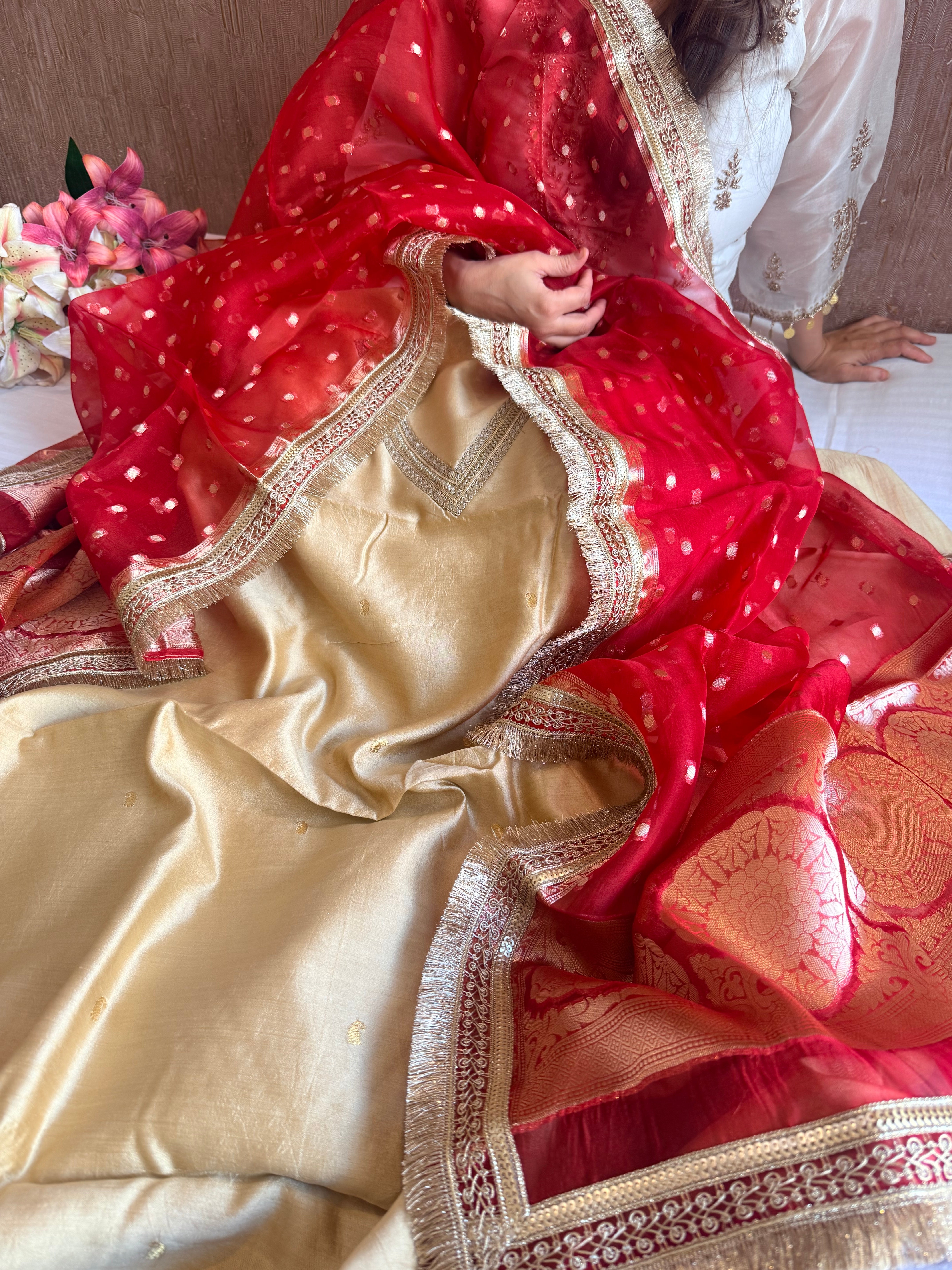 Beige-red chiniya silk kadhwa buta kurta paired with kora silk red duppata