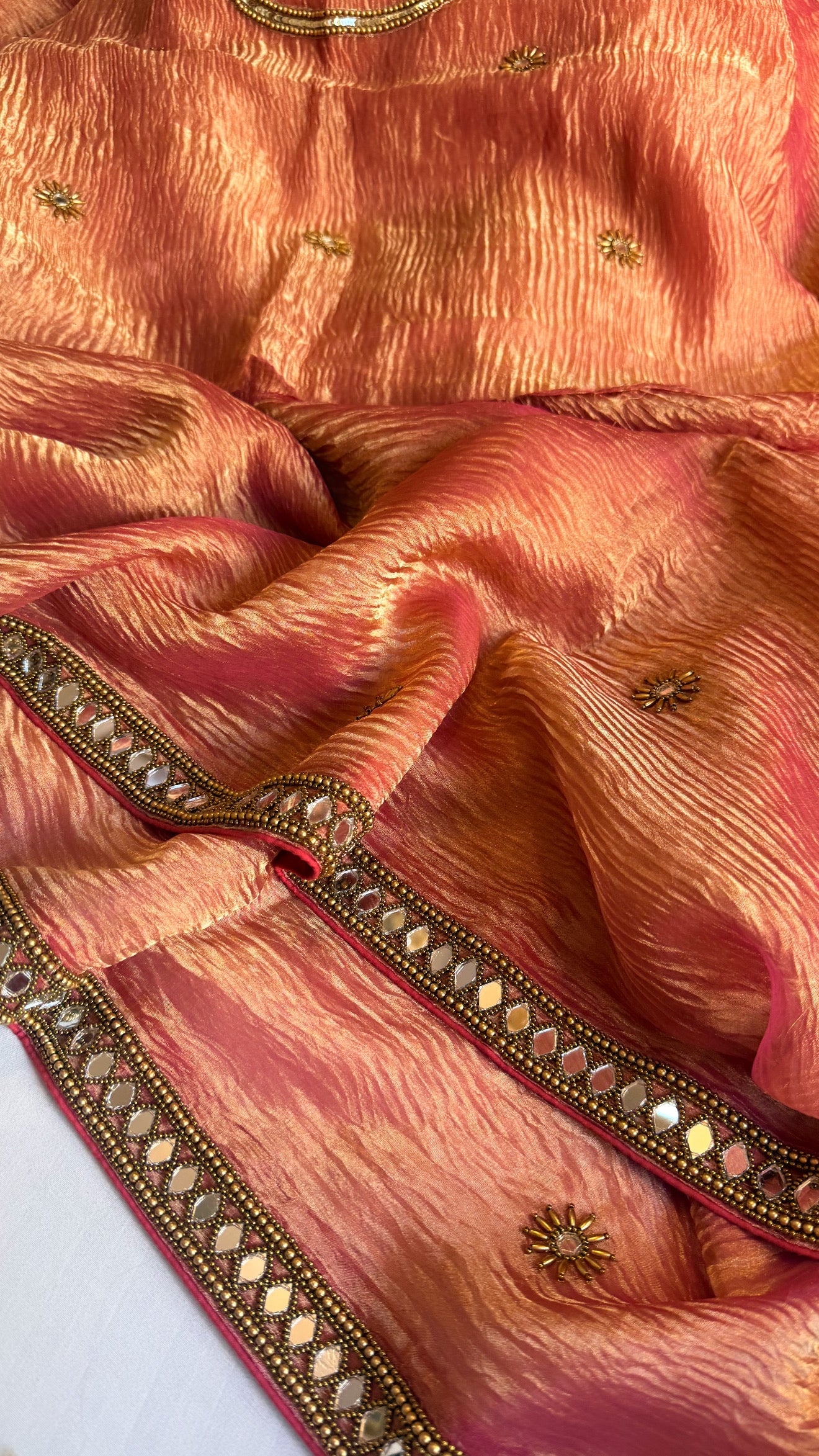 Mirrorwork edit gajri pink crushed tissue silk hand embroidered saree