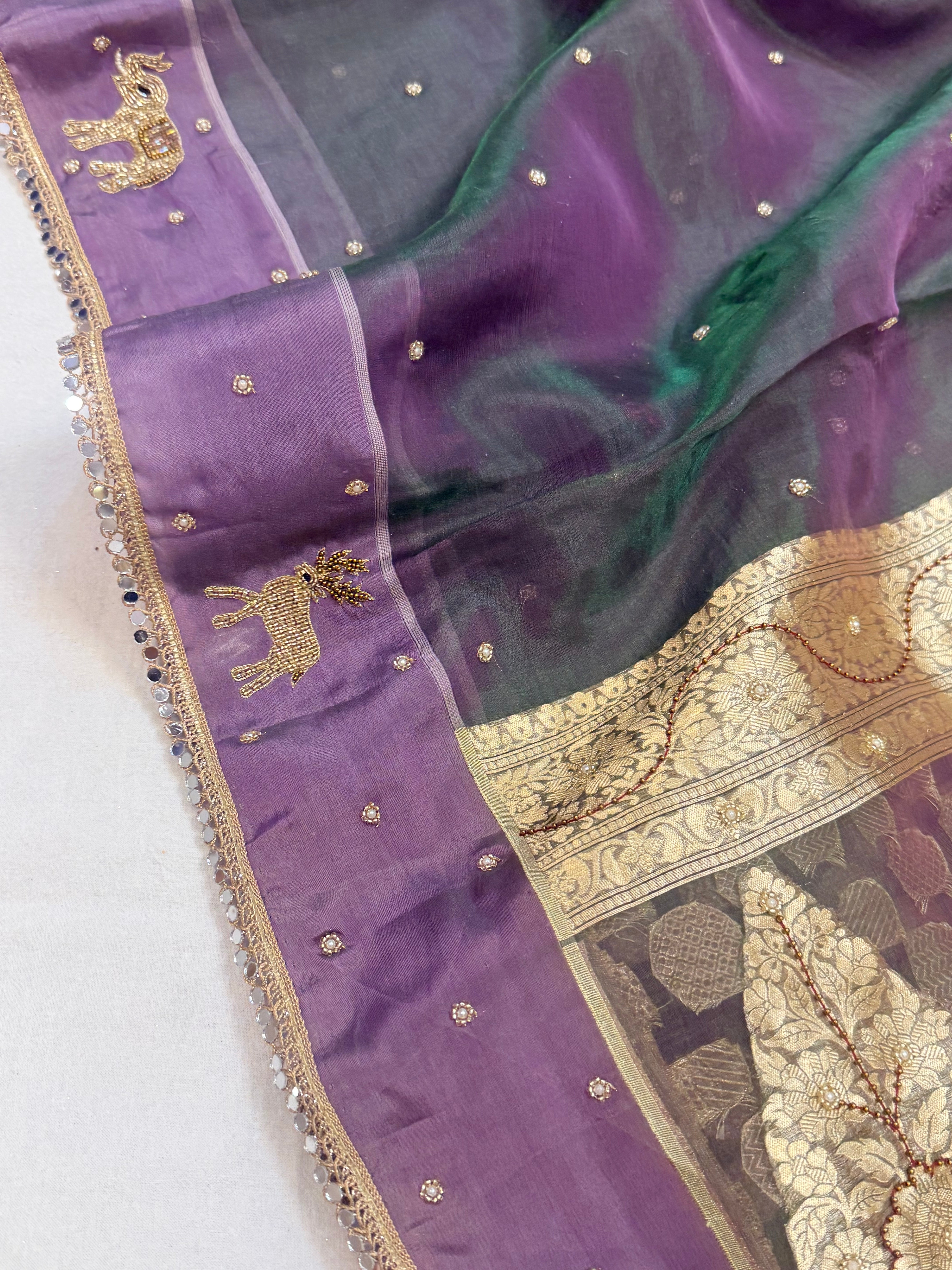 Midnight purple-green dhup chao effect tissue silk hand embroidered saree