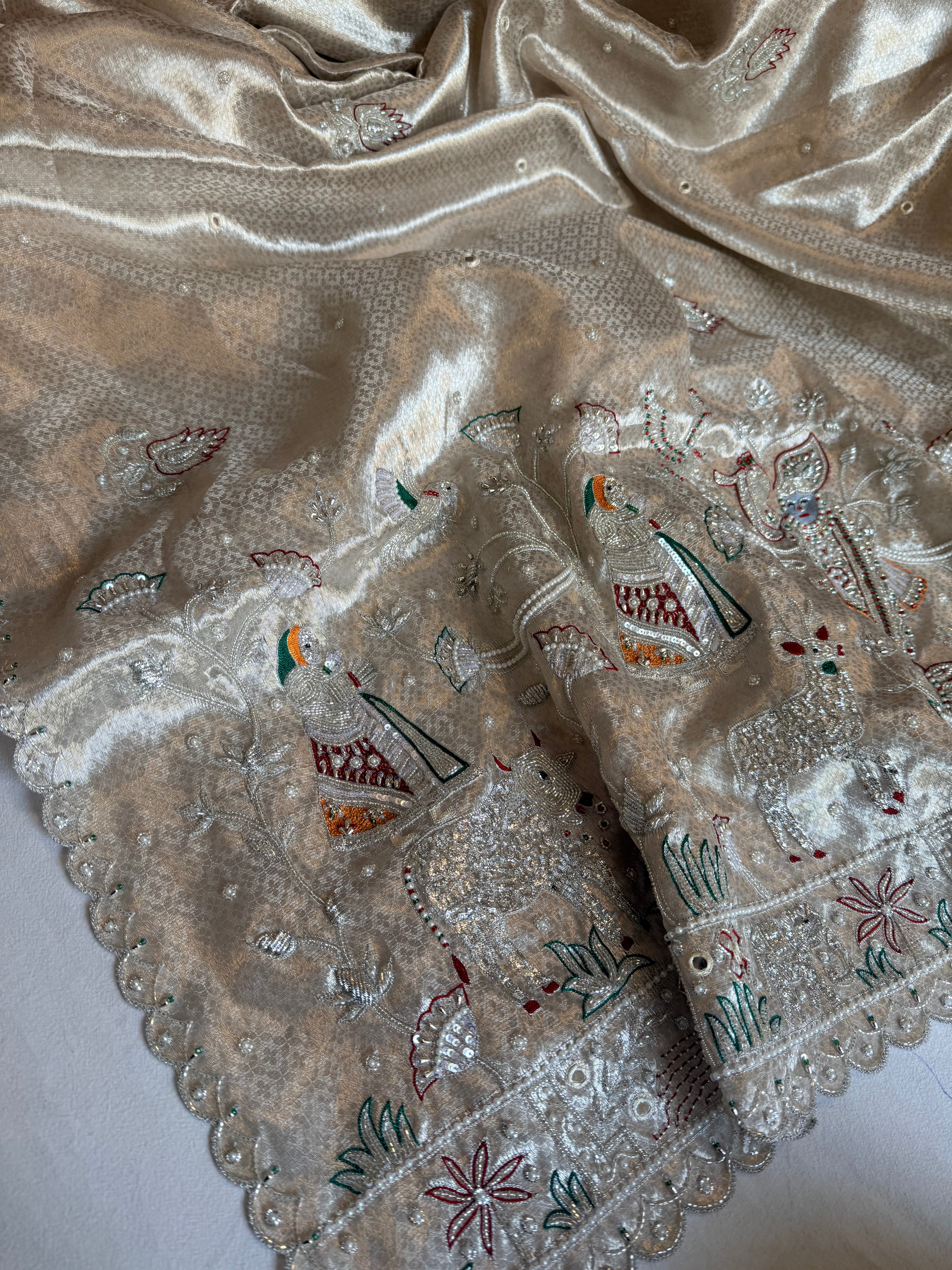 Chandi silver tissue brocade shrinathji motif inspired kadhwa hand embroidered saree