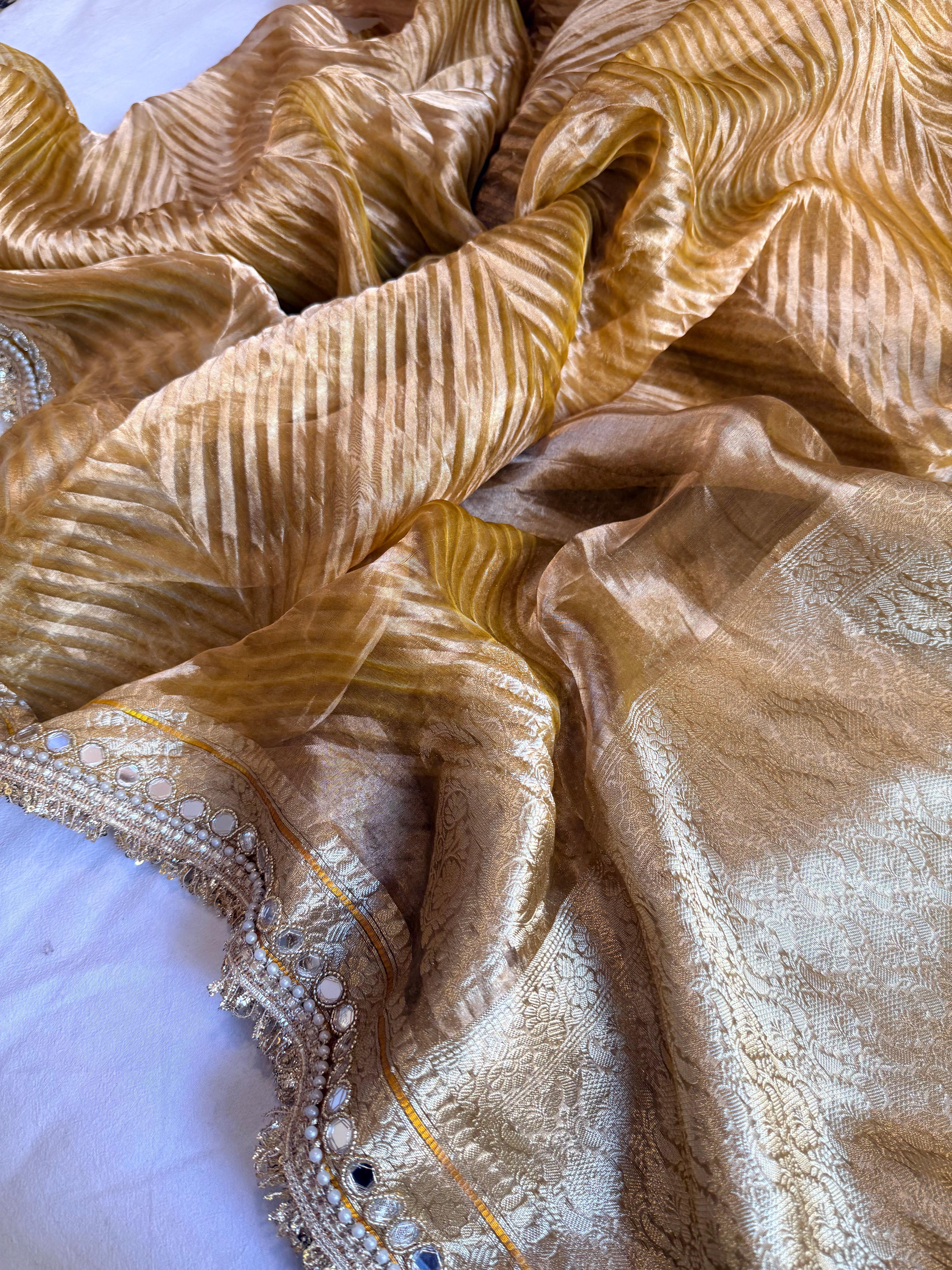 Yellow gold tissue silk arshi dyed mirrorwork hand embroidered kadhwa saree