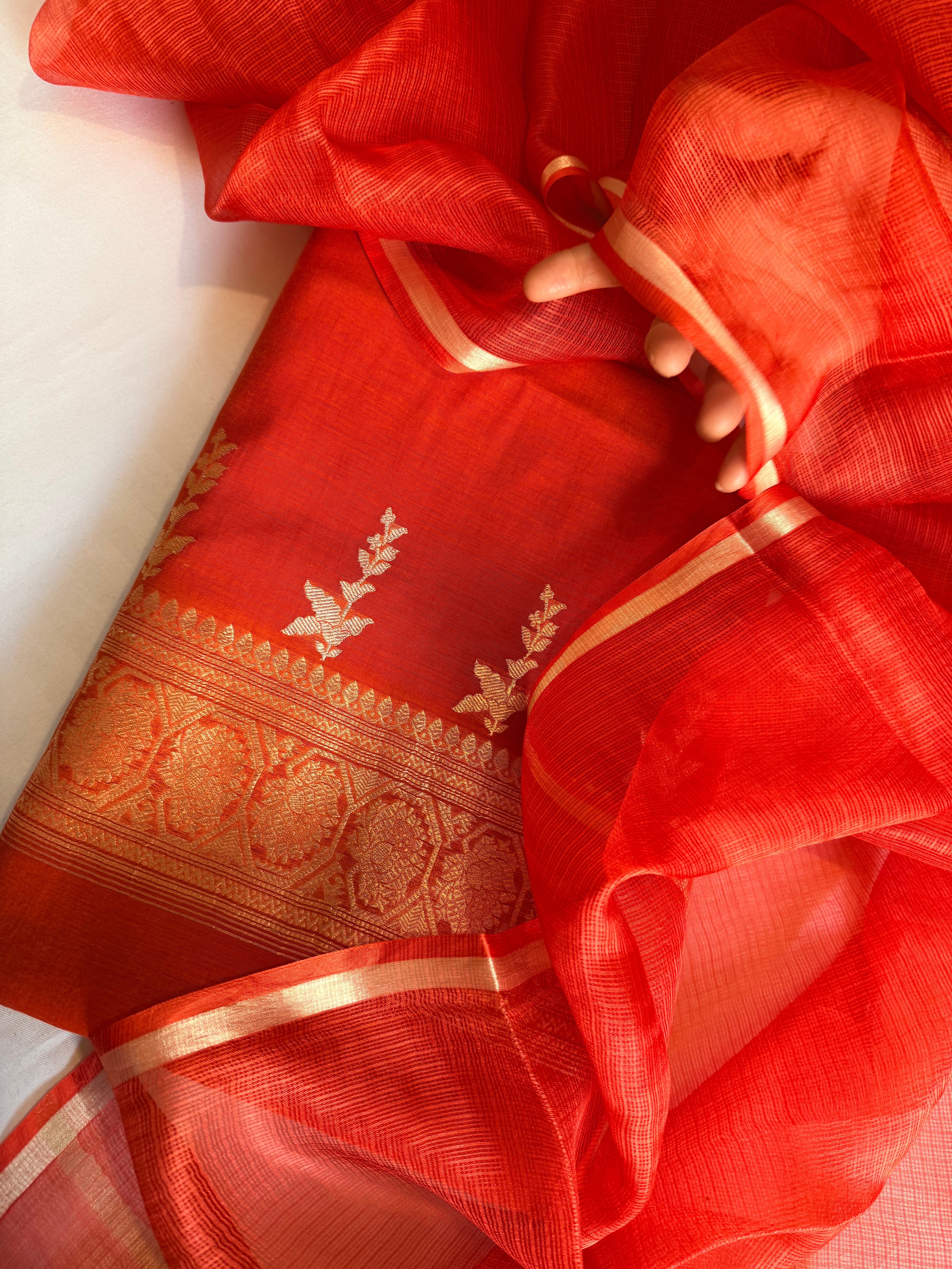 Rust red mul cotton kadhwa buti kurta paired with kora silk net duppata set