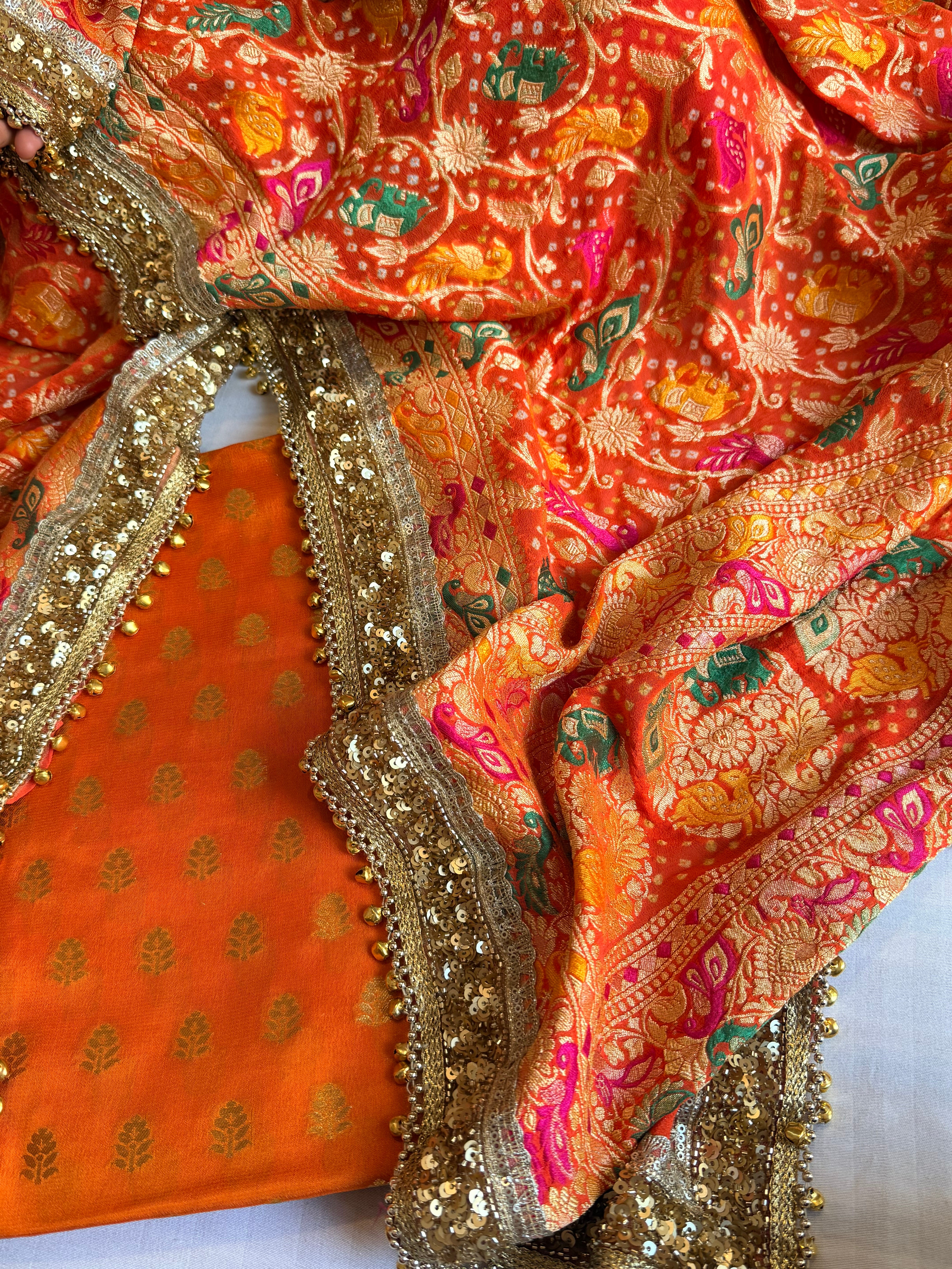 Banarasi bandhej fanta orange ghungroo and sequin work chiffon gorgette kadhwa suit set