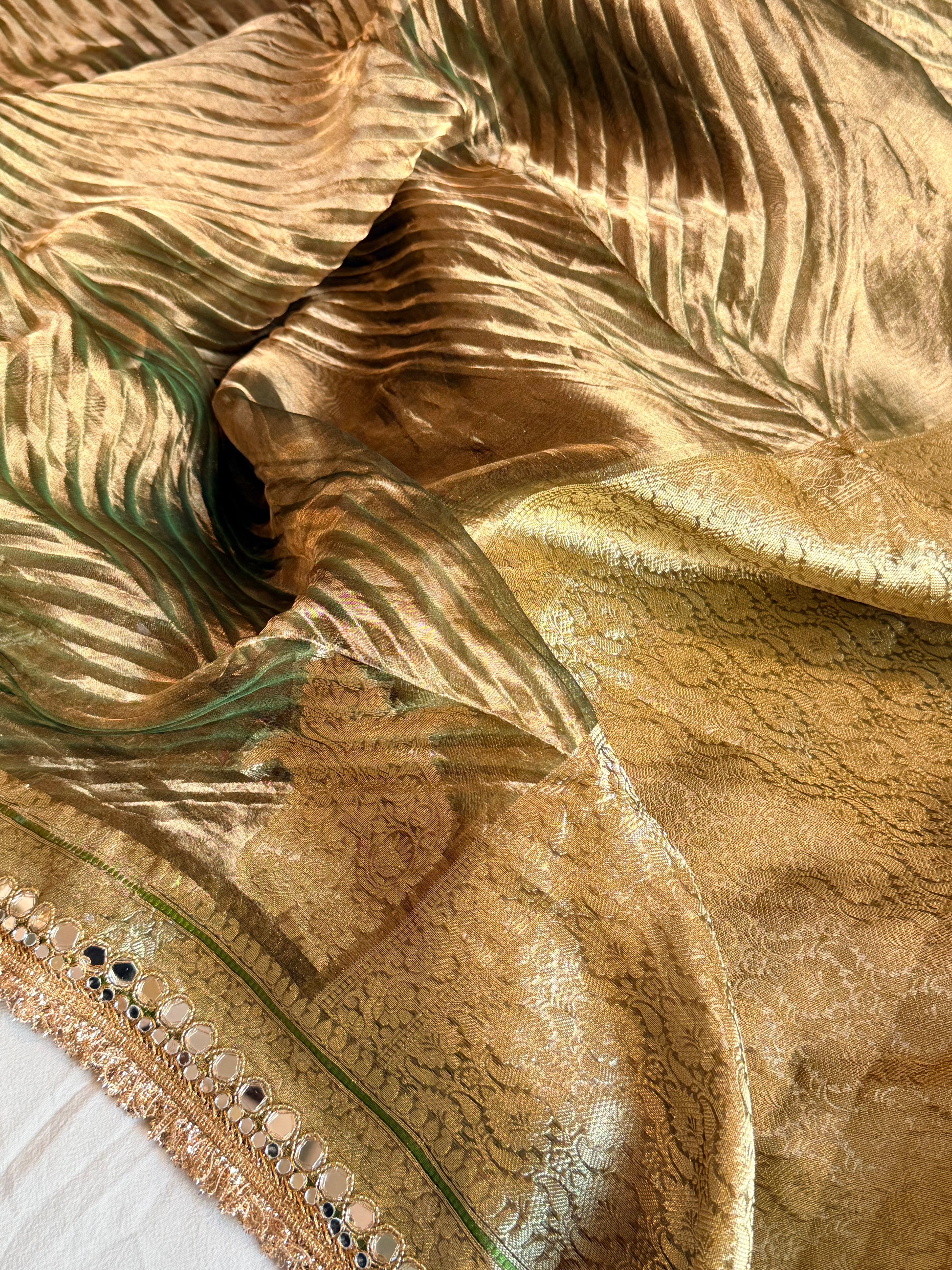 Mint green tissue silk arshi dyed mirrorwork hand embroidered kadhwa saree