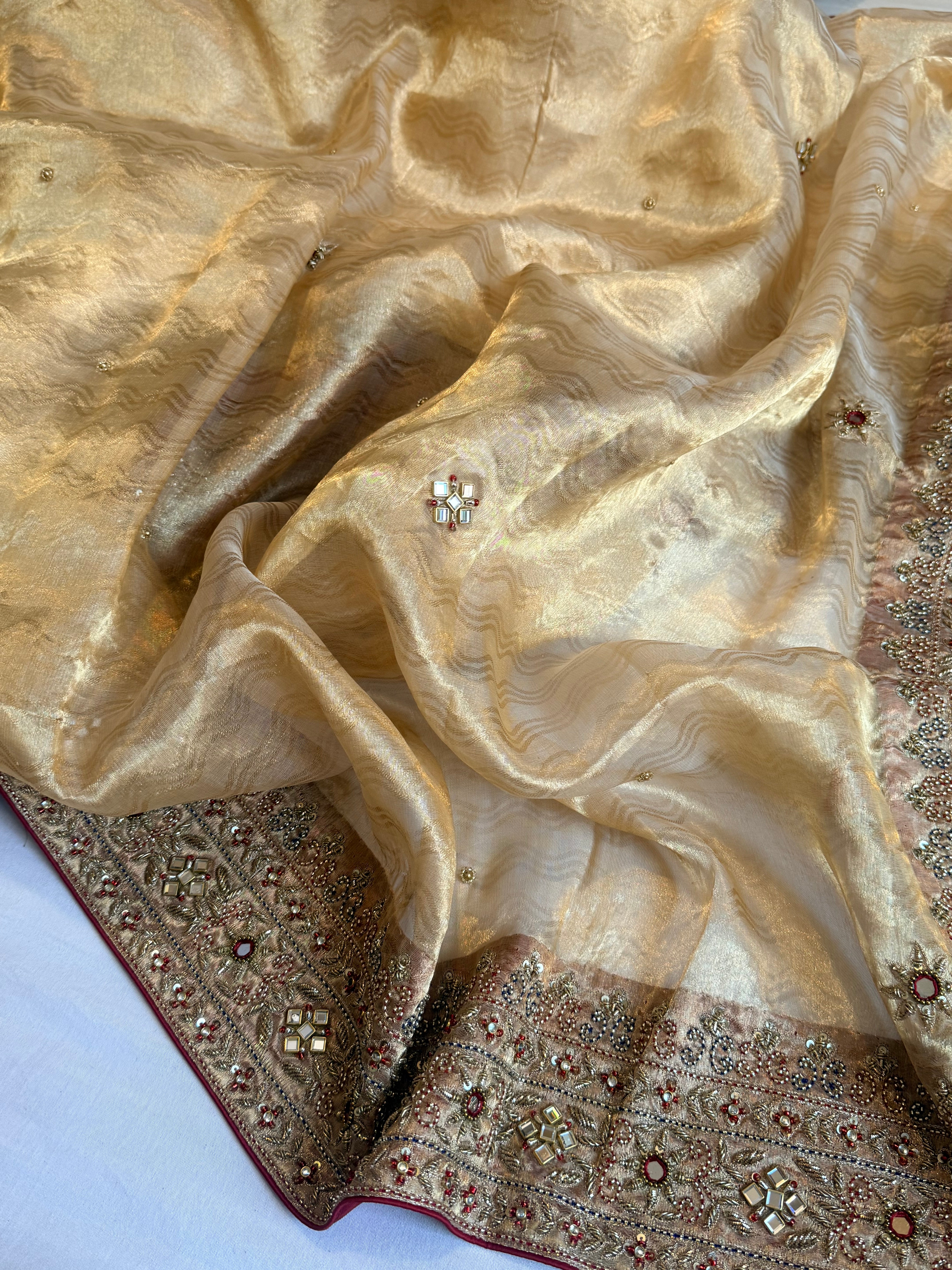 Zardozi & Jadauwork border tissue silk hand embroidered kadhwa butter gold saree