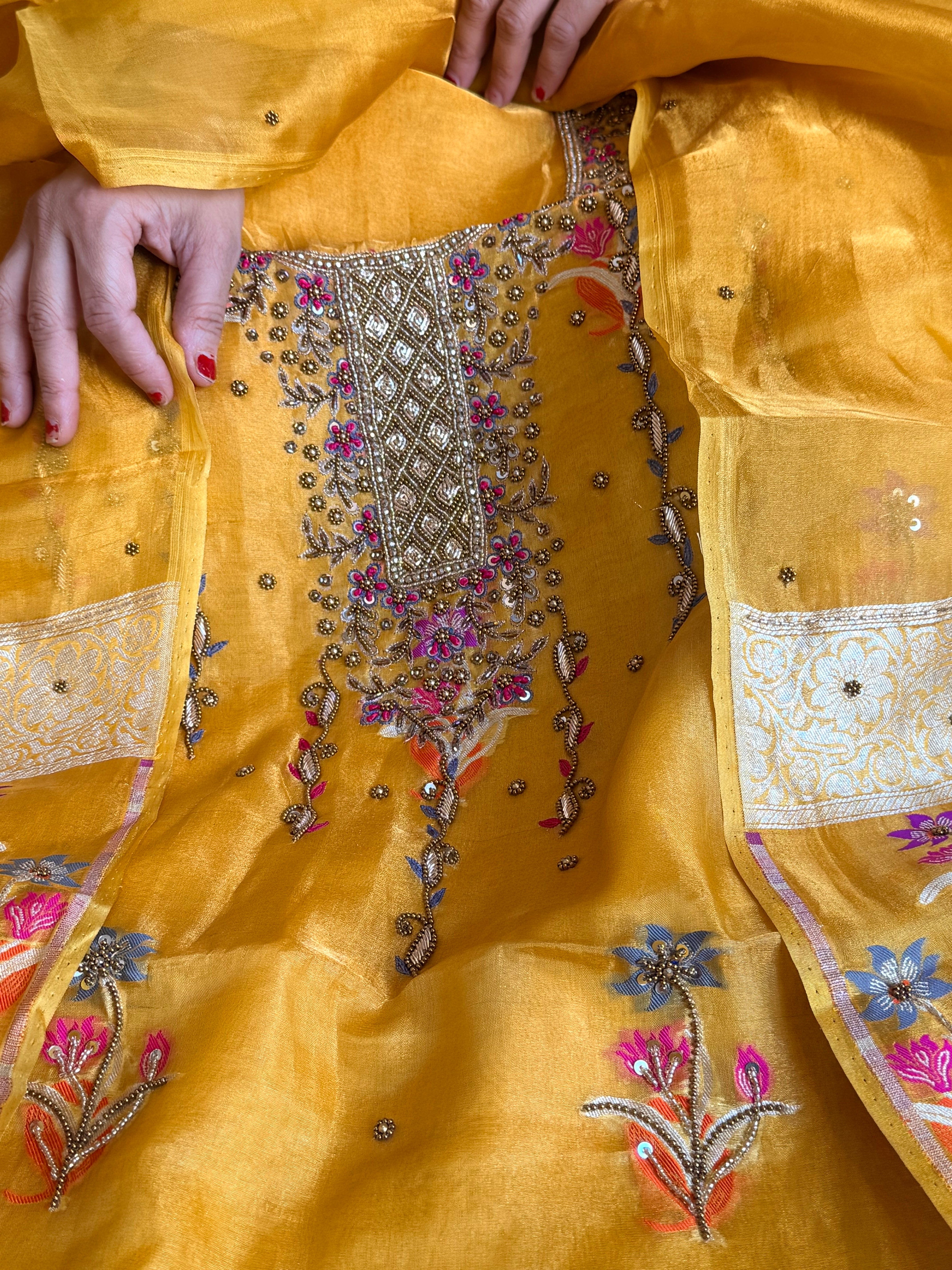 Banarasi tissue silk haldi yellow tissue silk meenakari hand embroidered suit set