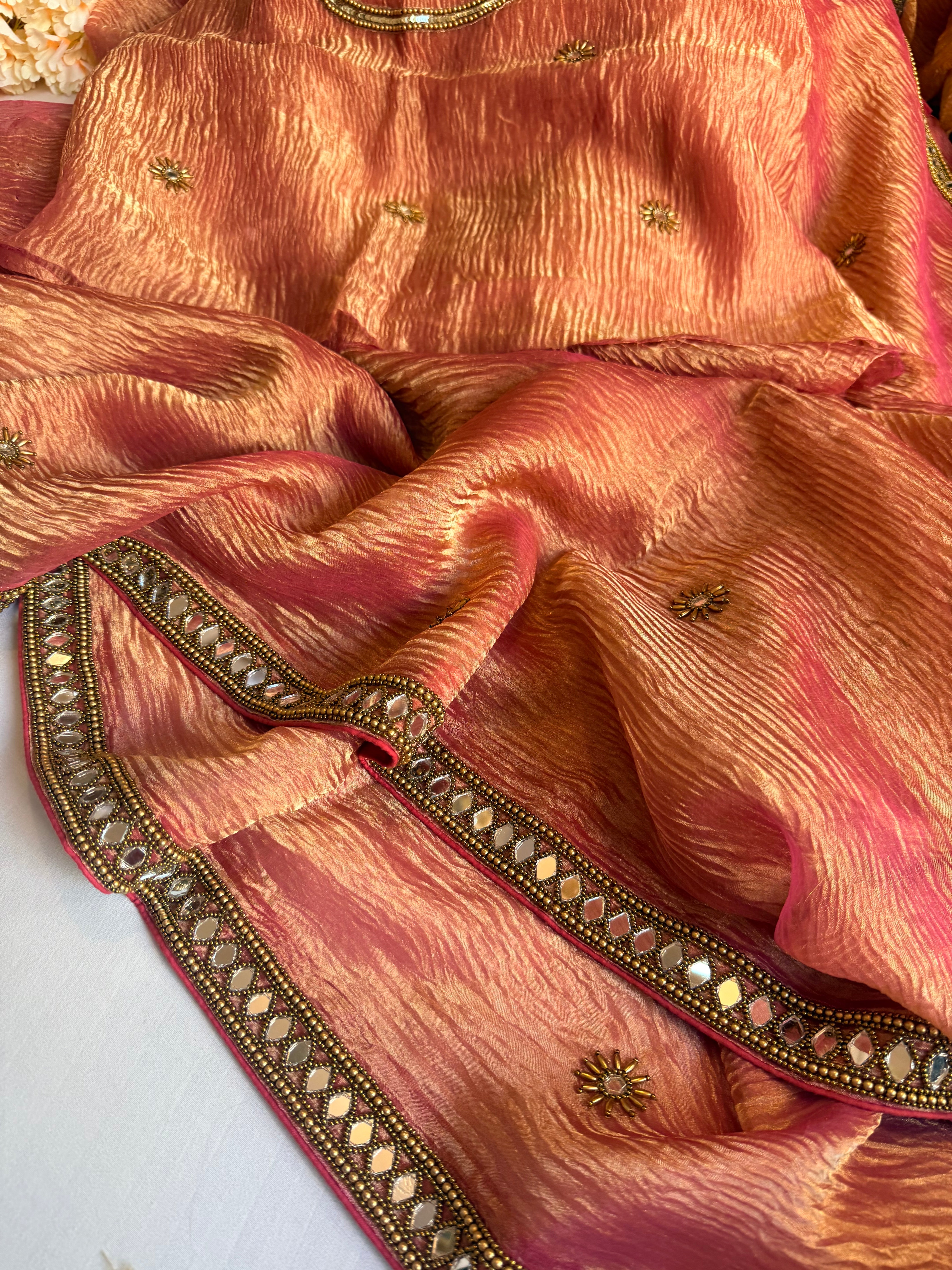 Mirrorwork edit gajri pink crushed tissue silk hand embroidered saree