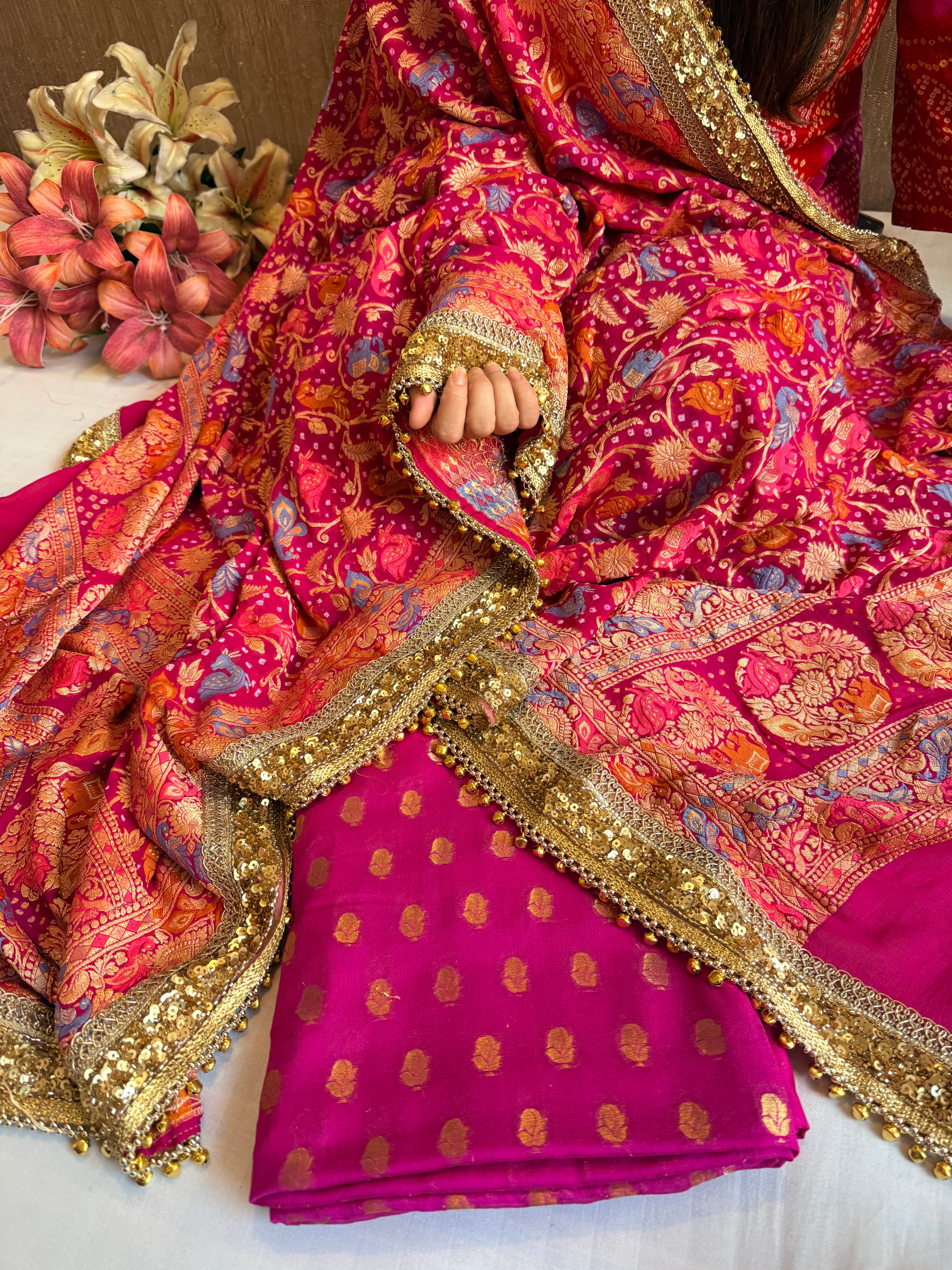 Banarasi hot pink bandhej ghungroo and sequin work chiffon gorgette kadhwa suit set
