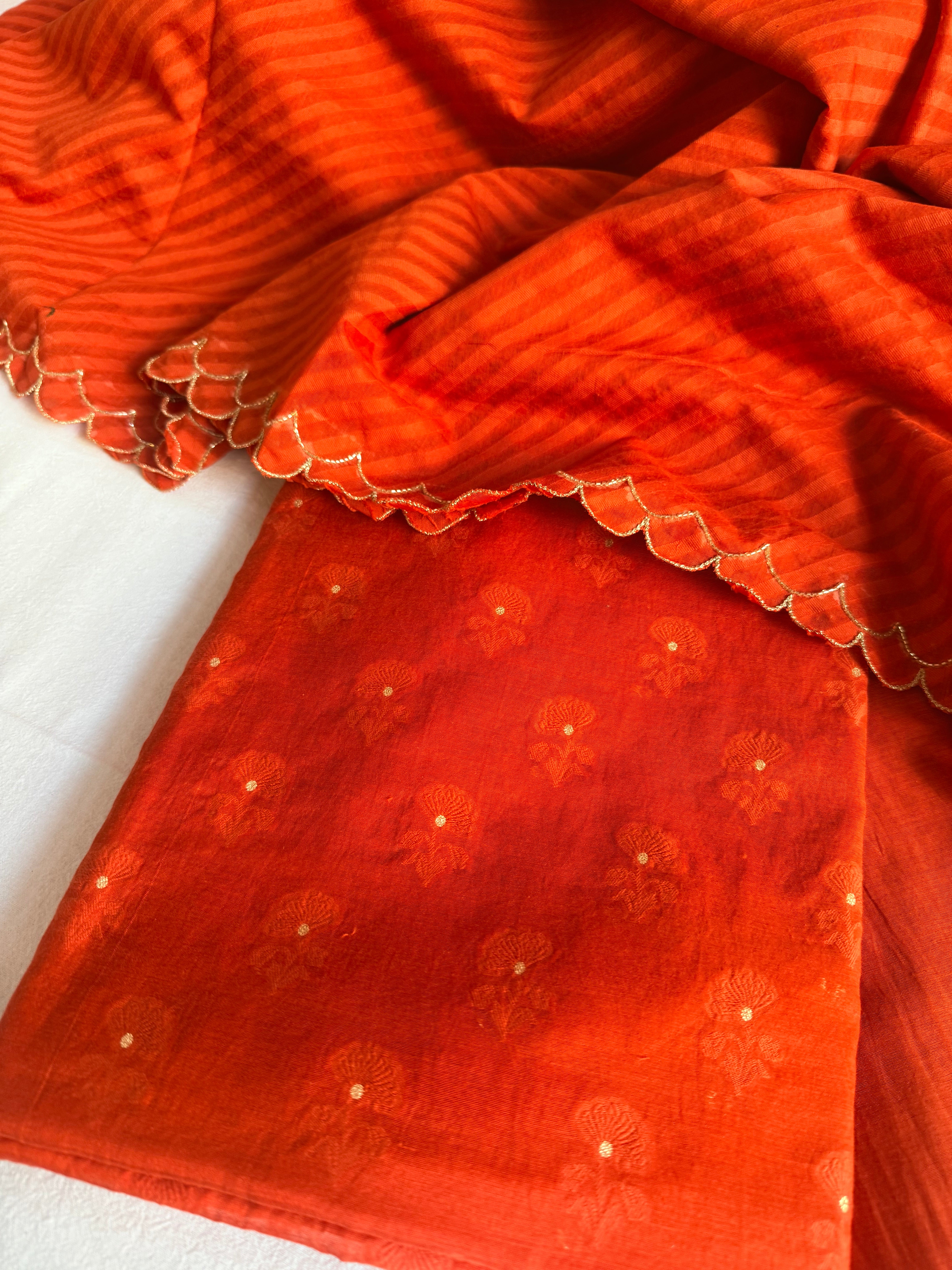 Summer suits under 8k - Mul cotton burnt orange kurta paired with cotton sscalloped duppata set