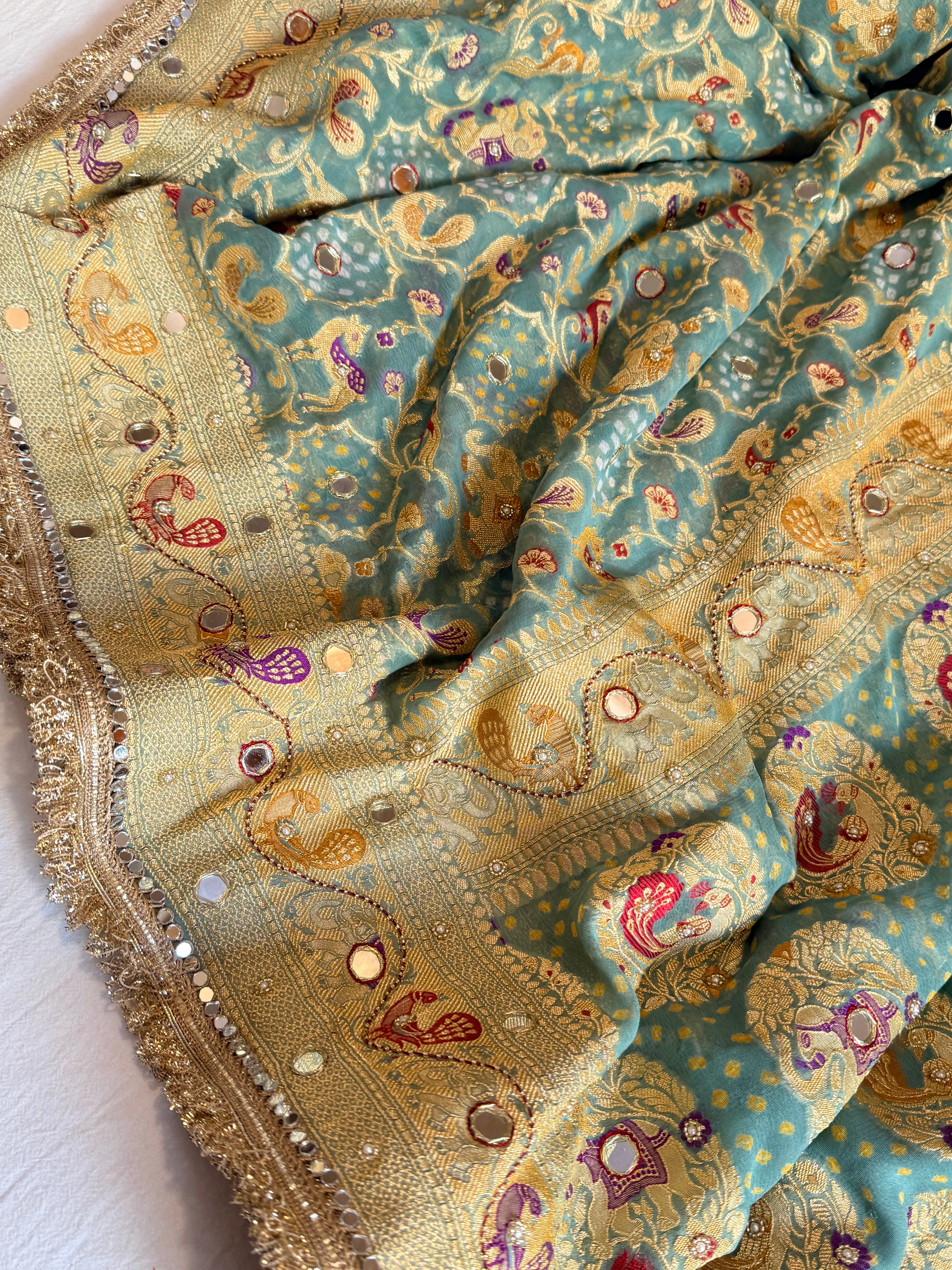 Banarasi blush shades of chiffon rai bandhej mirror work hand embroidered saree