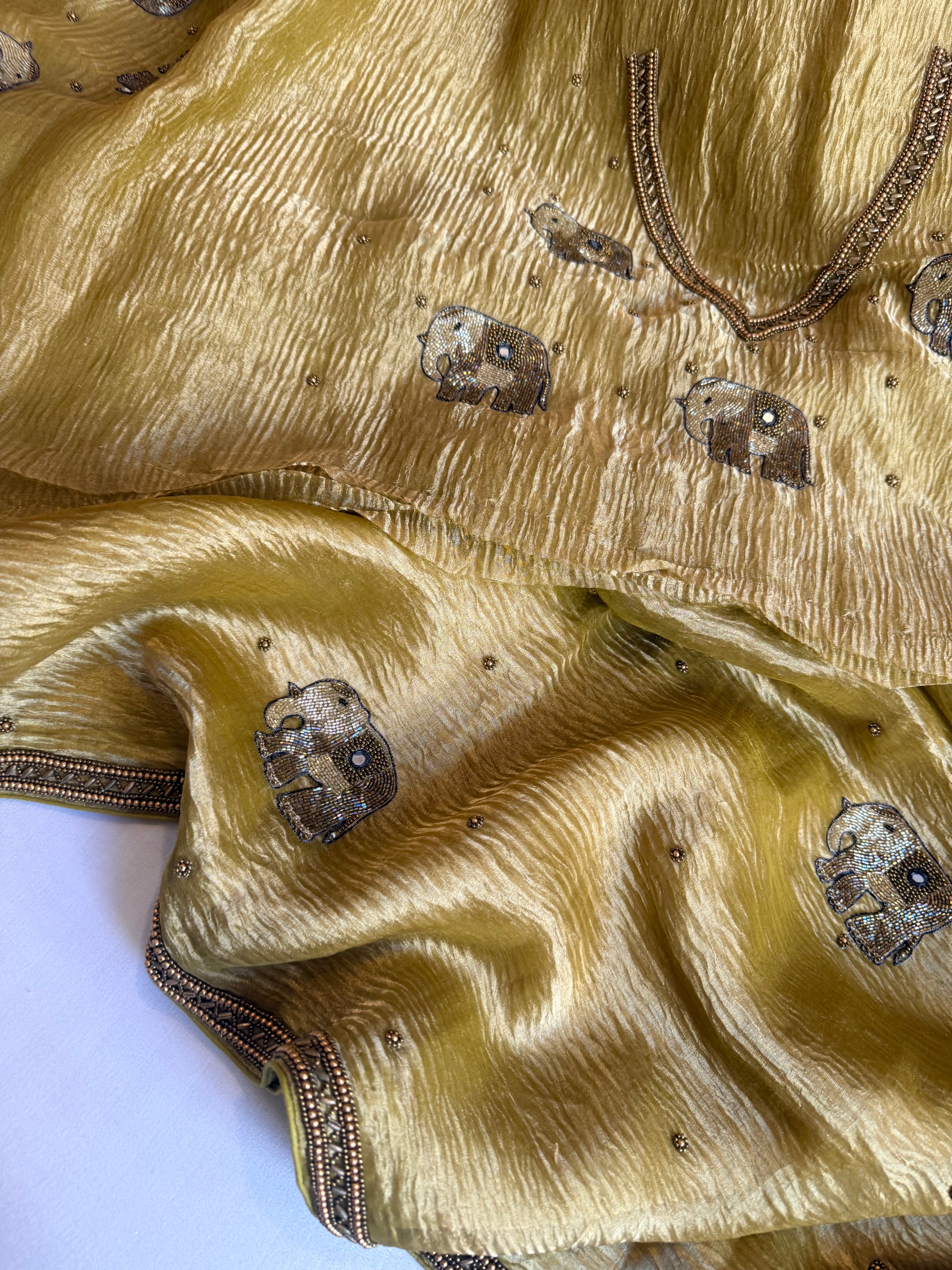 Mirrorwork edit lemon yellow crushed tissue silk hand embroidered saree