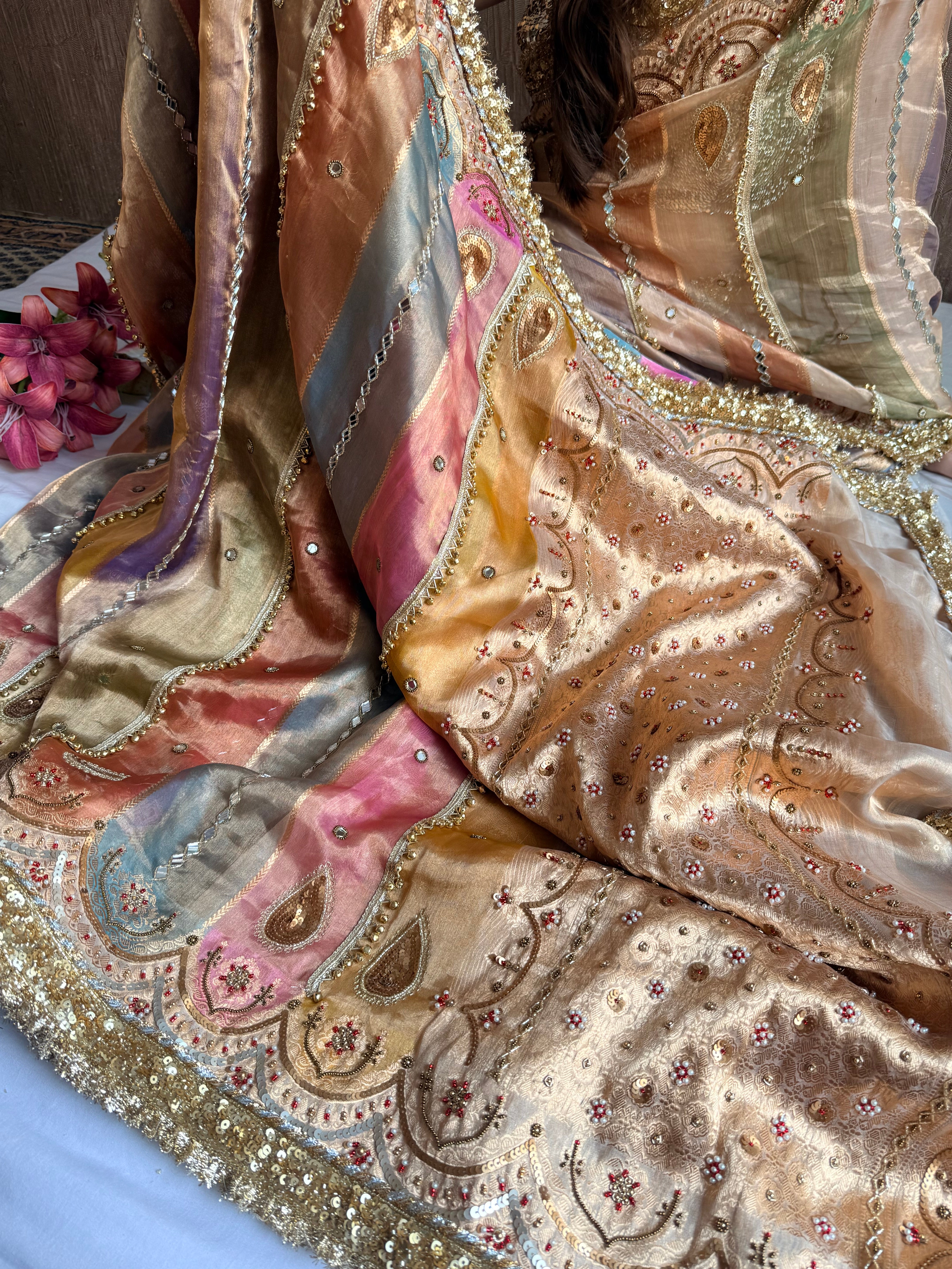 Navratan edit tissue silk rangkaat and ghungroo work hand embroidered saree