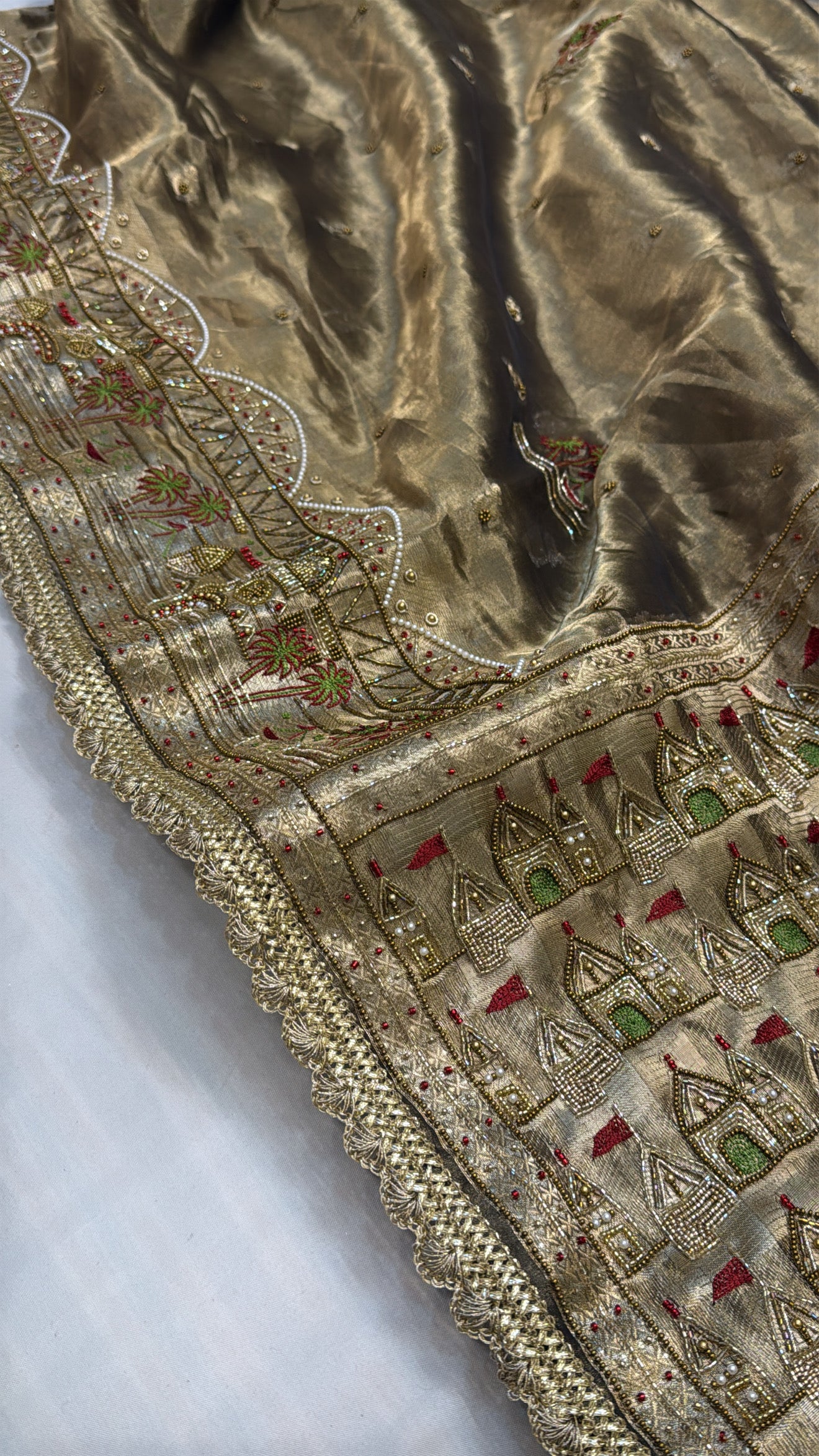 Gangakinare edit molten gold tissue silk hand embroidered saree