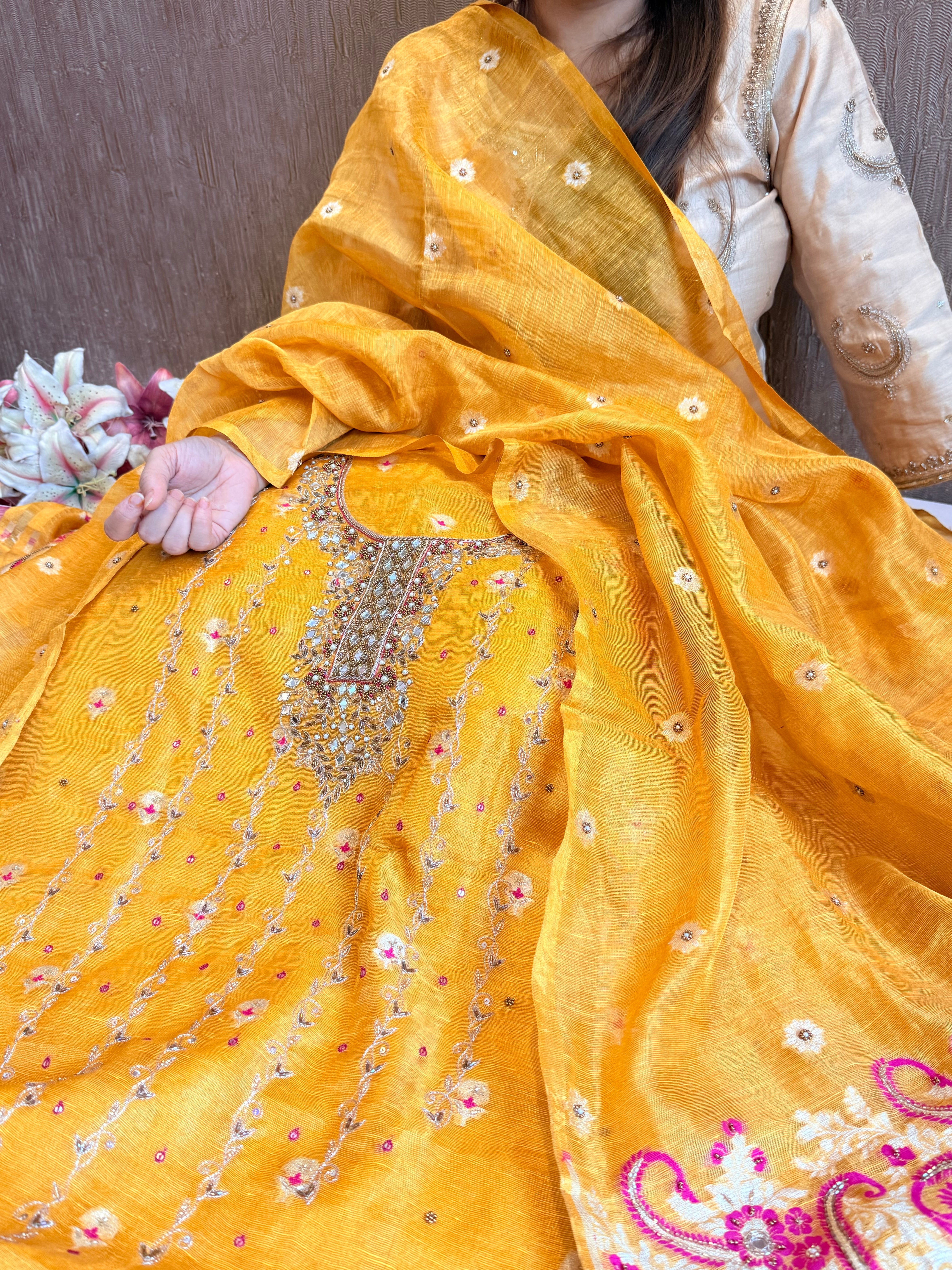 Haldi yellow mul linen tissue silk meenakari hand embroidered suits