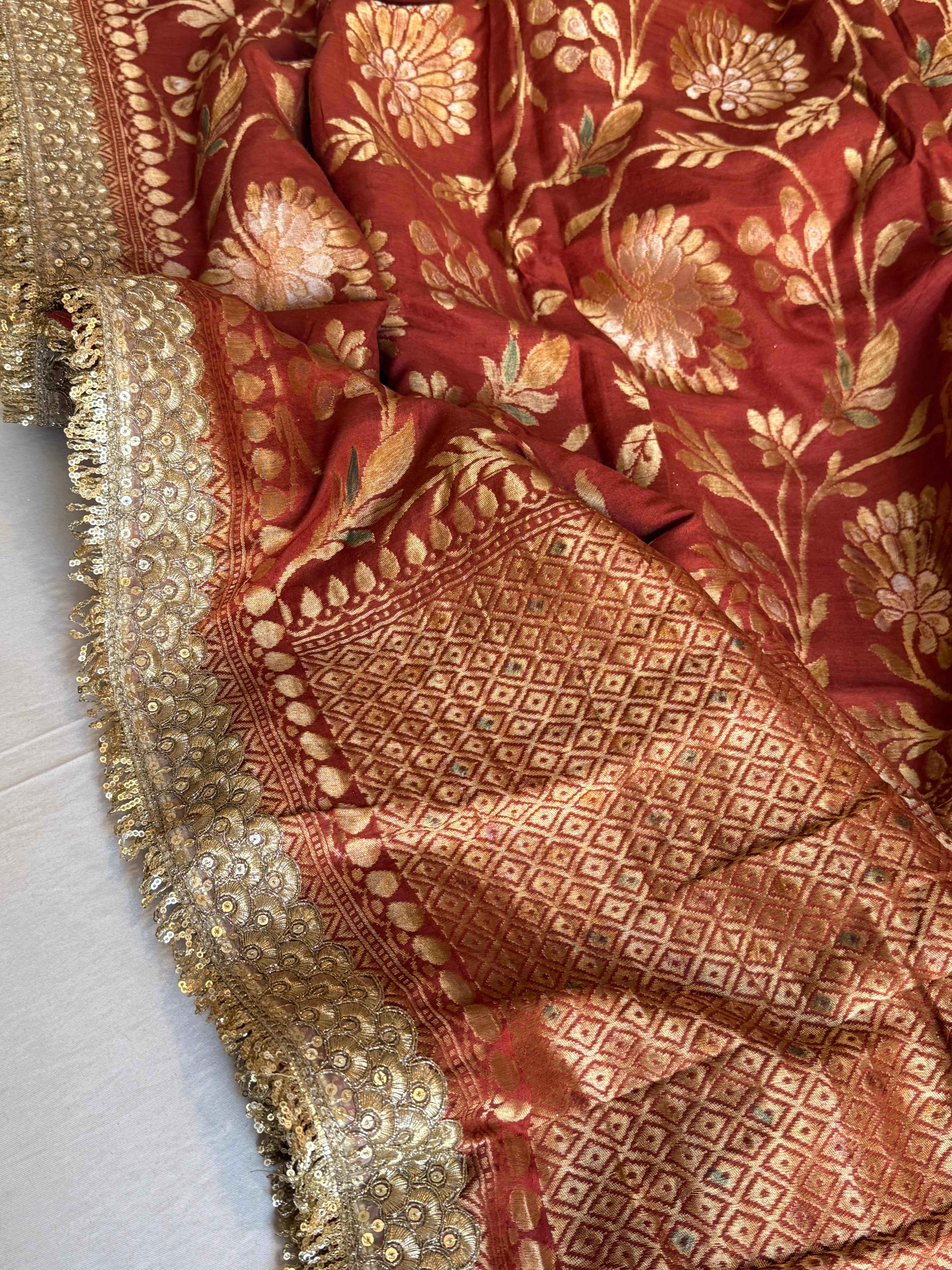 Maroonish red moonga silk meenakari jungla kadhwa saree