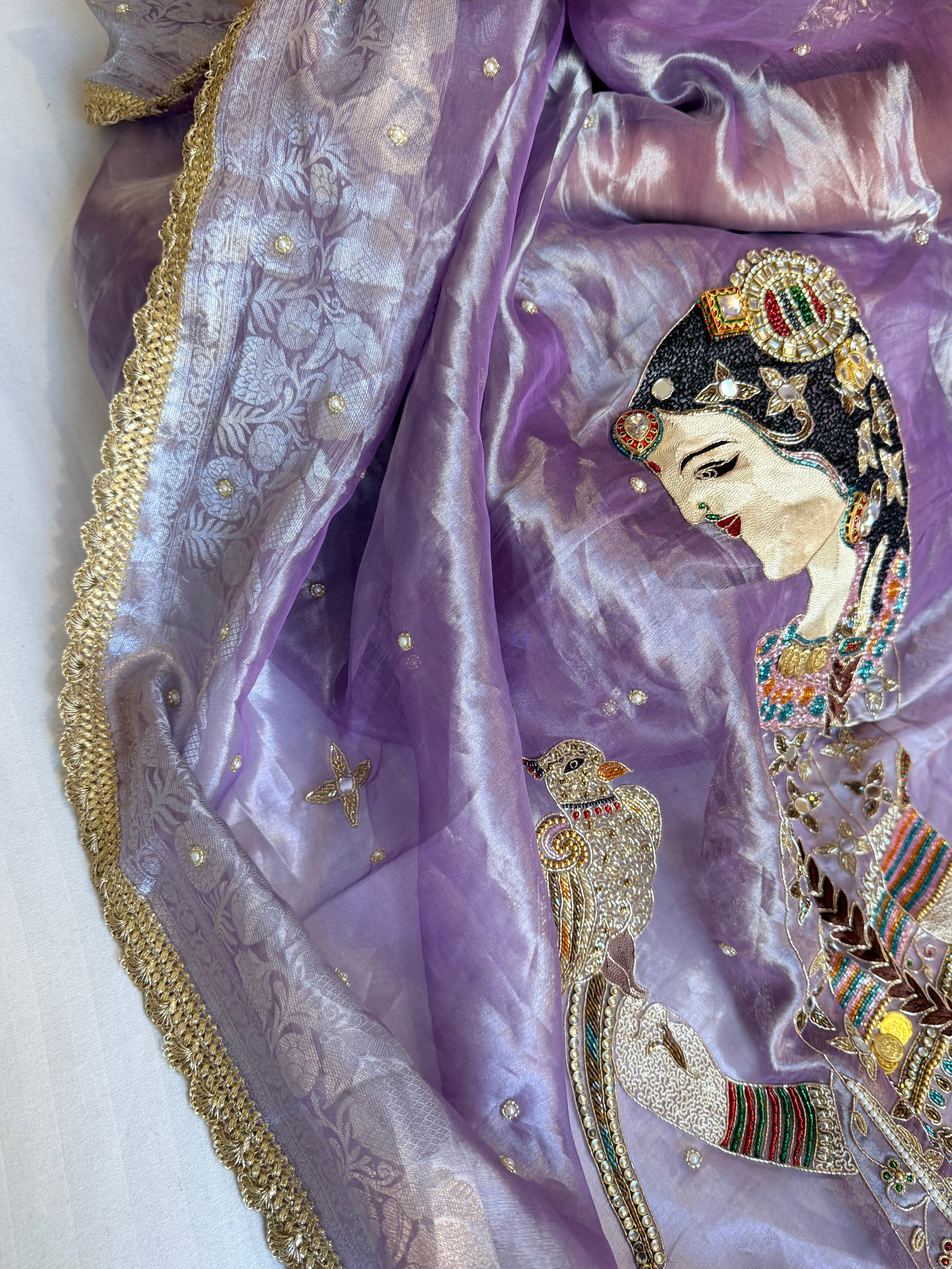 Heer saree with jadau necklace work hand embroidered tissue silk lilac saree