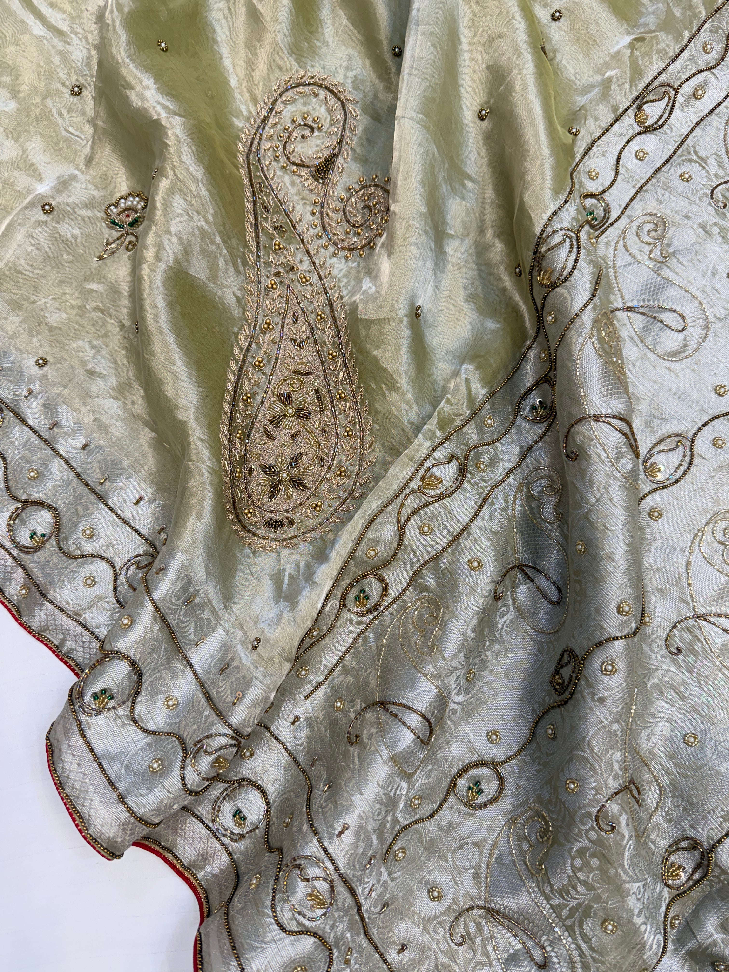 Mint green husn tissue silk meenakari hand embroidered kadhwa saree