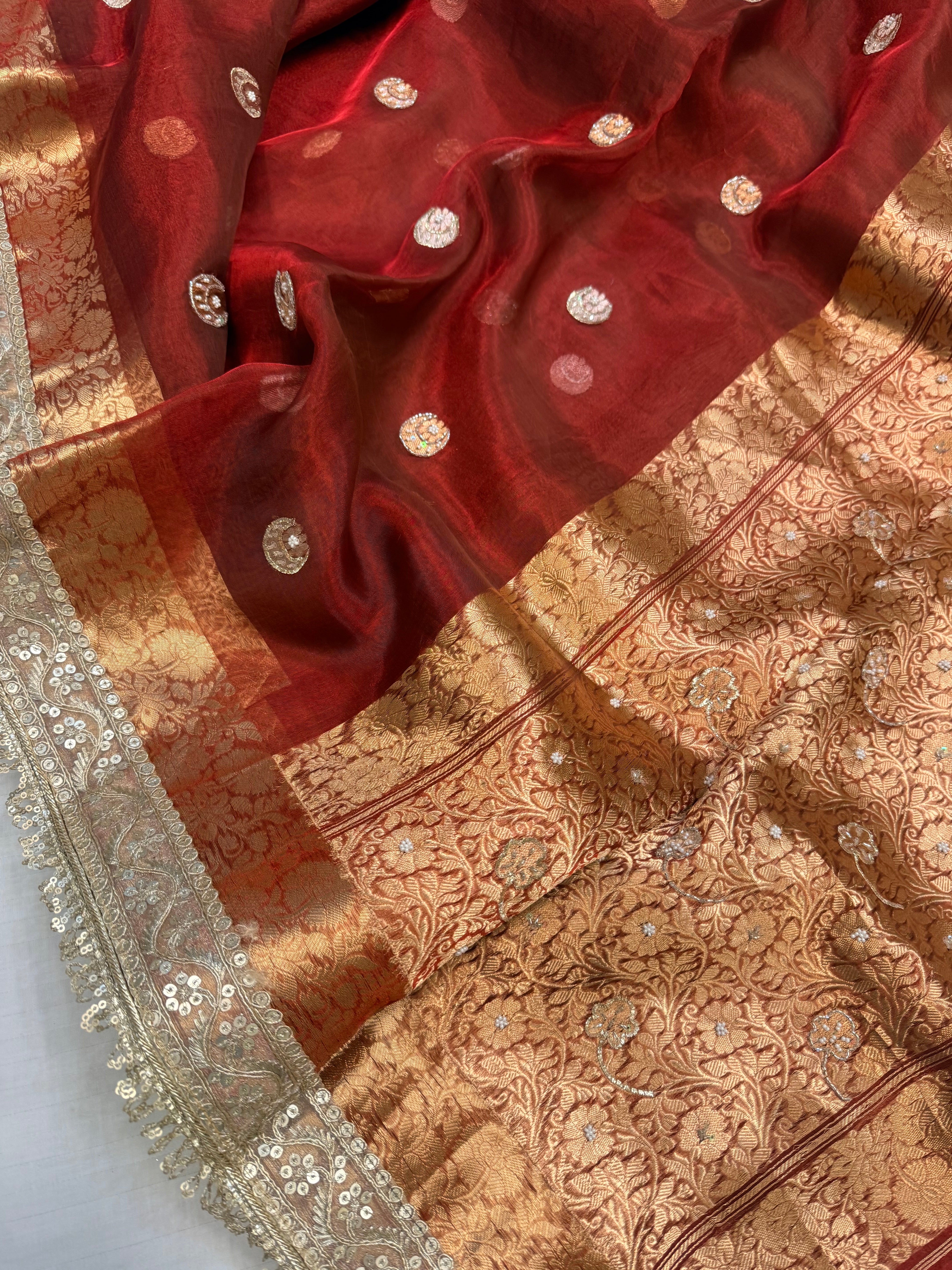 Metallic blood red chand buta tissue silk hand embroidered saree