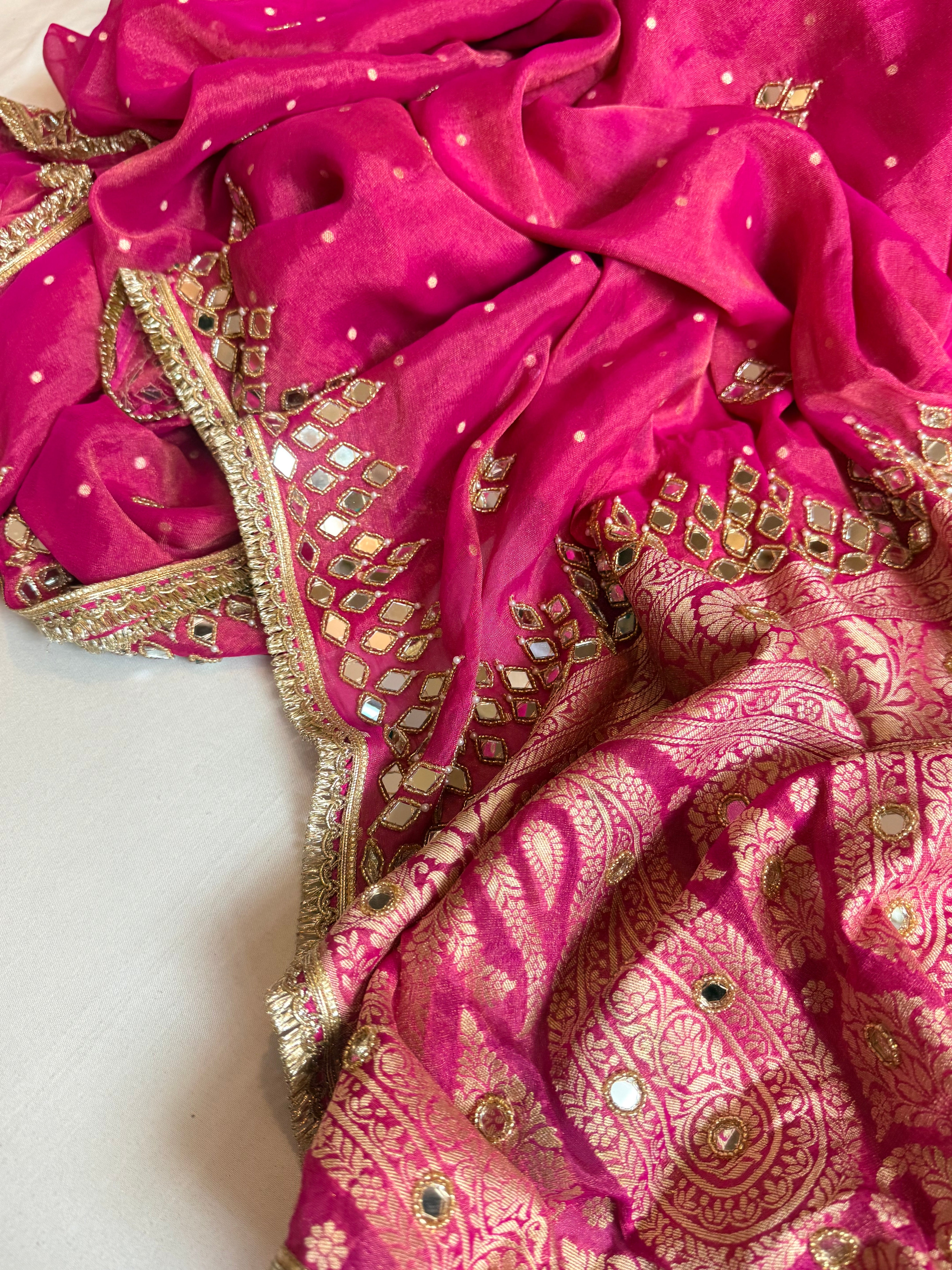Hot pink tissue gorgette mirror work hand embroidered saree
