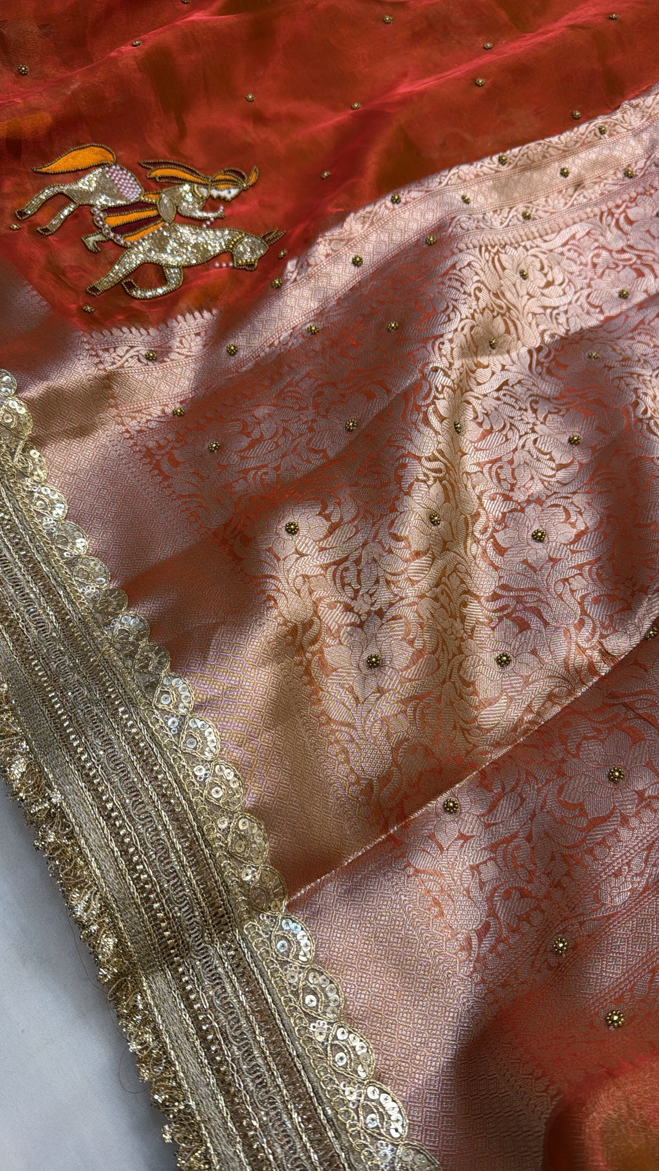 Sunset orange baarat motif husn tissue silk hand embroidered saree