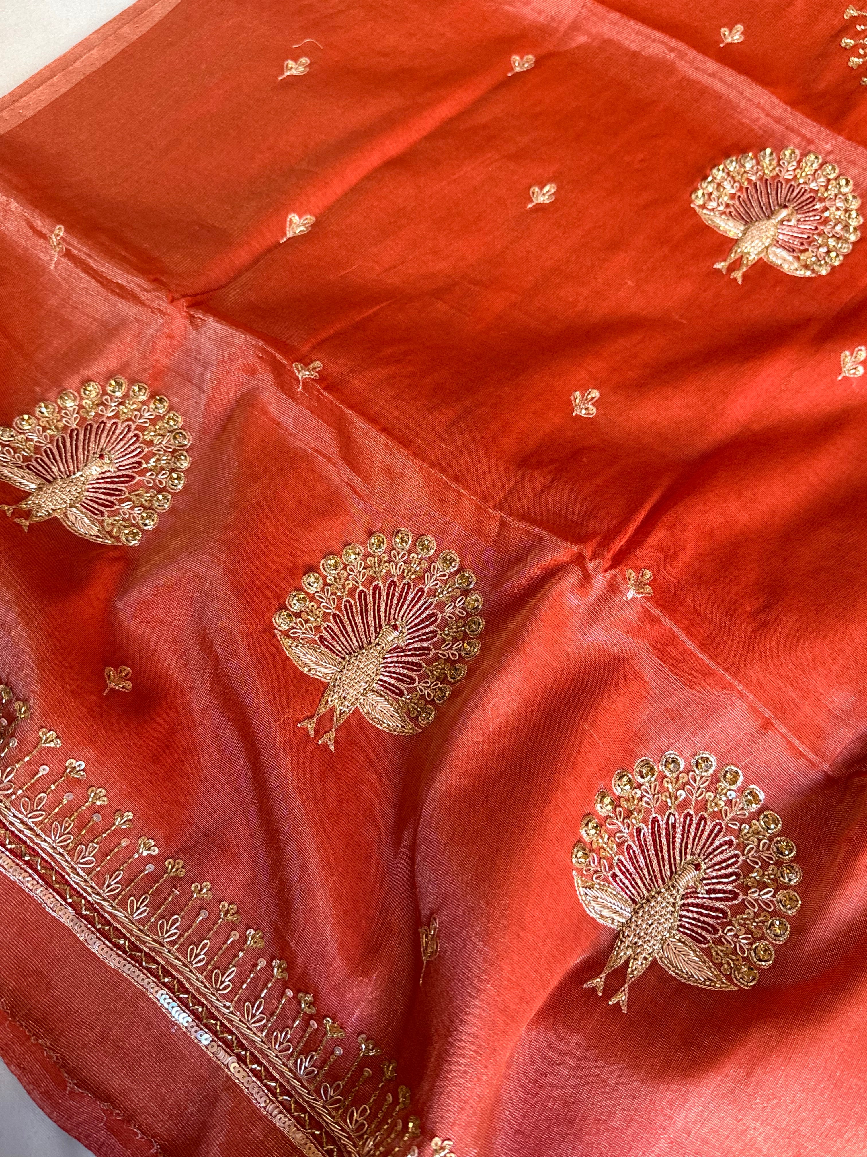 Reddish-orange mul tissue silk hand embroidered kadhwa suit set
