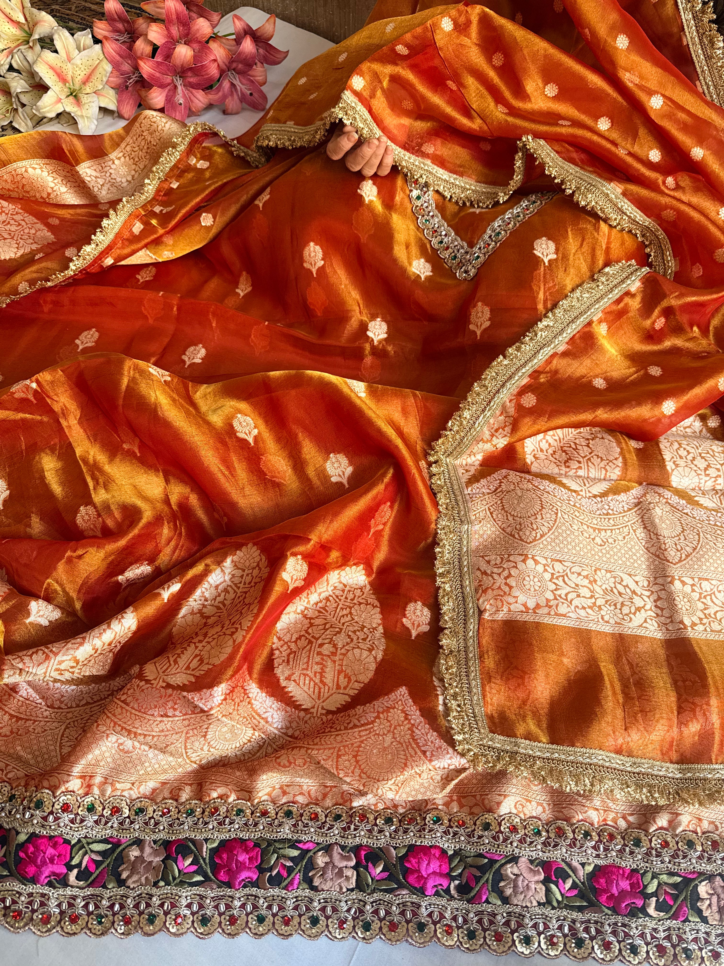 Navratna fanta orange tissue silk kadhwa buti hand embroidered suit sets