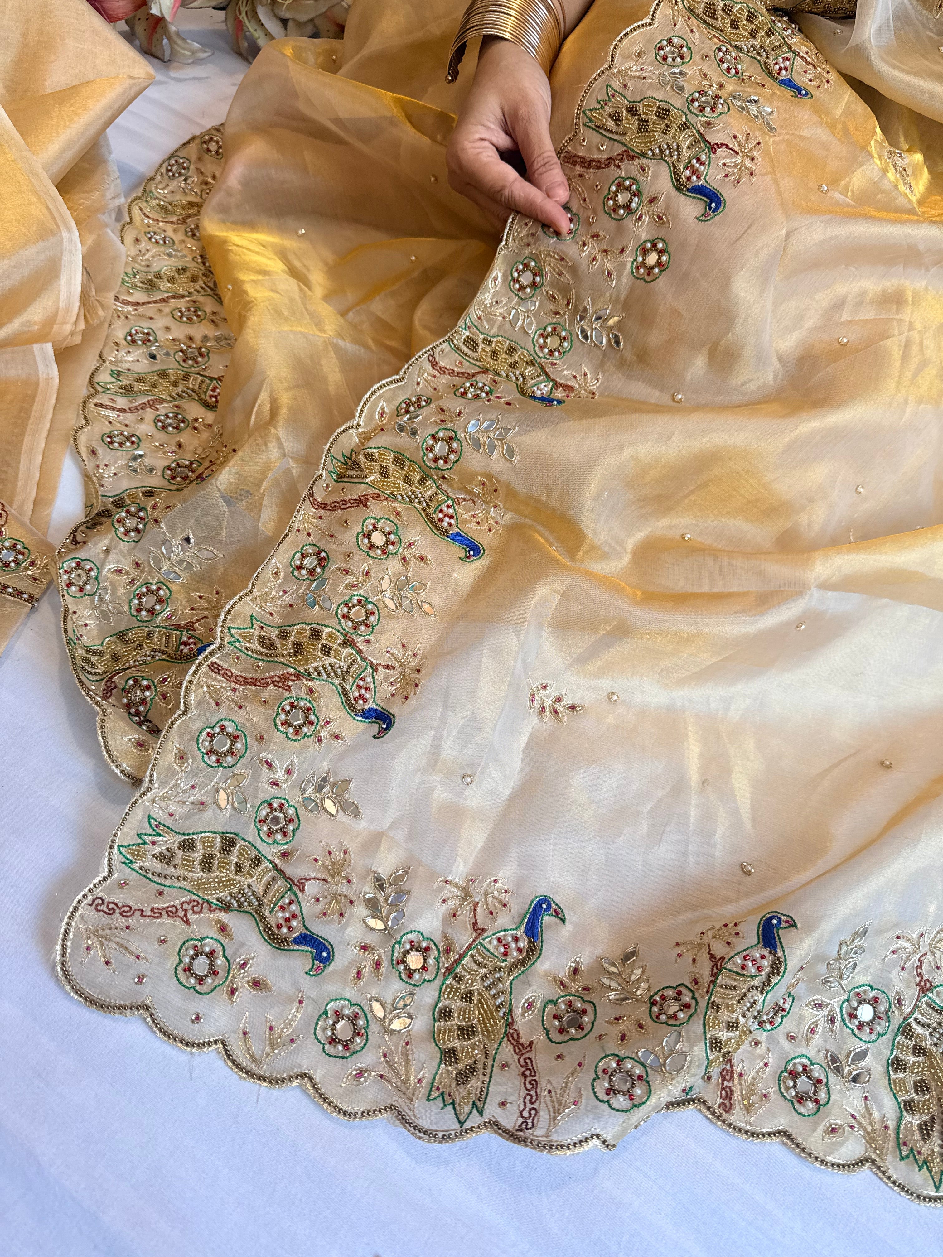Zardozi & Jadauwork border tissue silk hand embroidered kadhwa gold saree