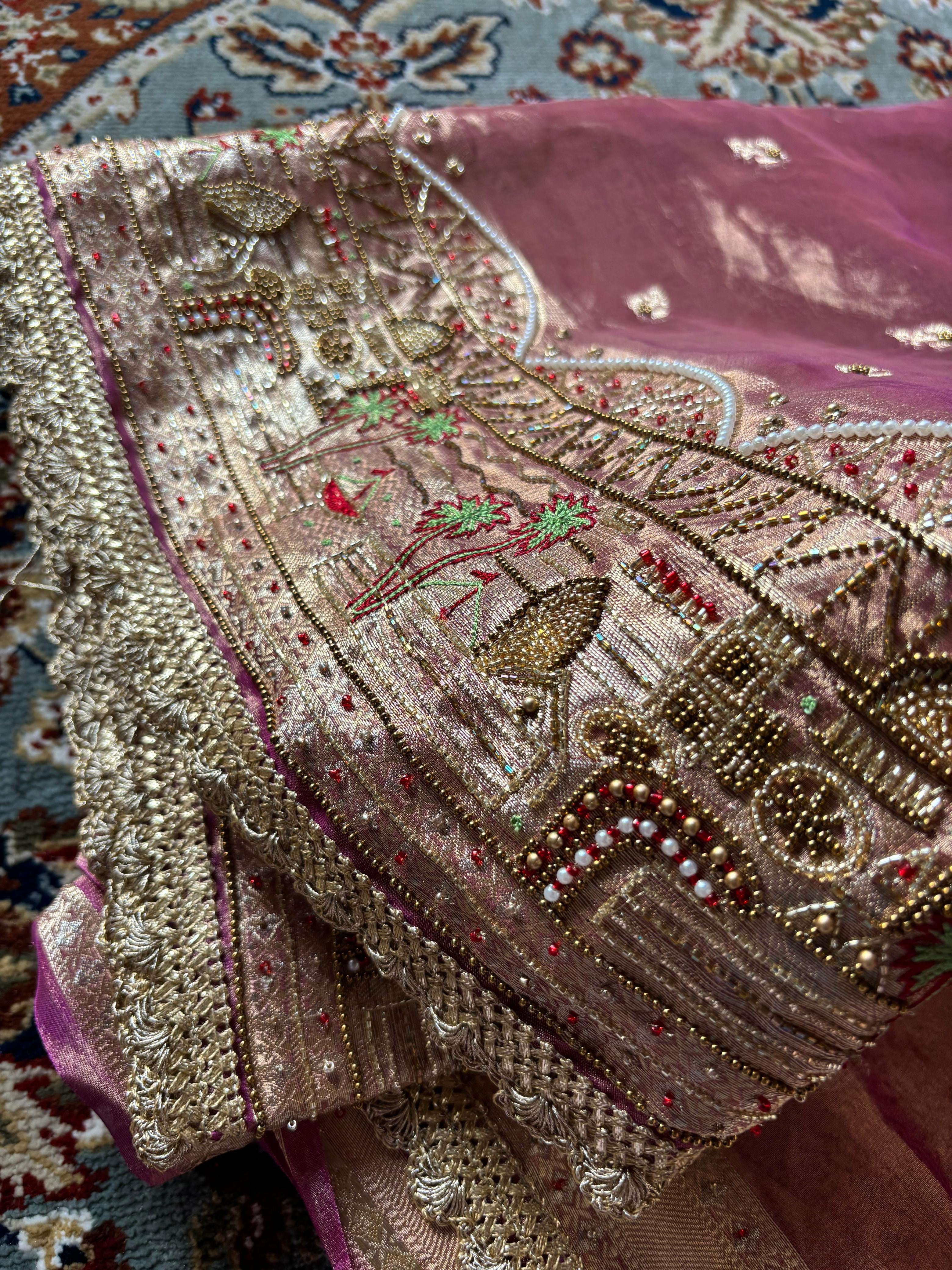 Gangakinare edit lotus purple tissue silk hand embroidered kadhwa saree