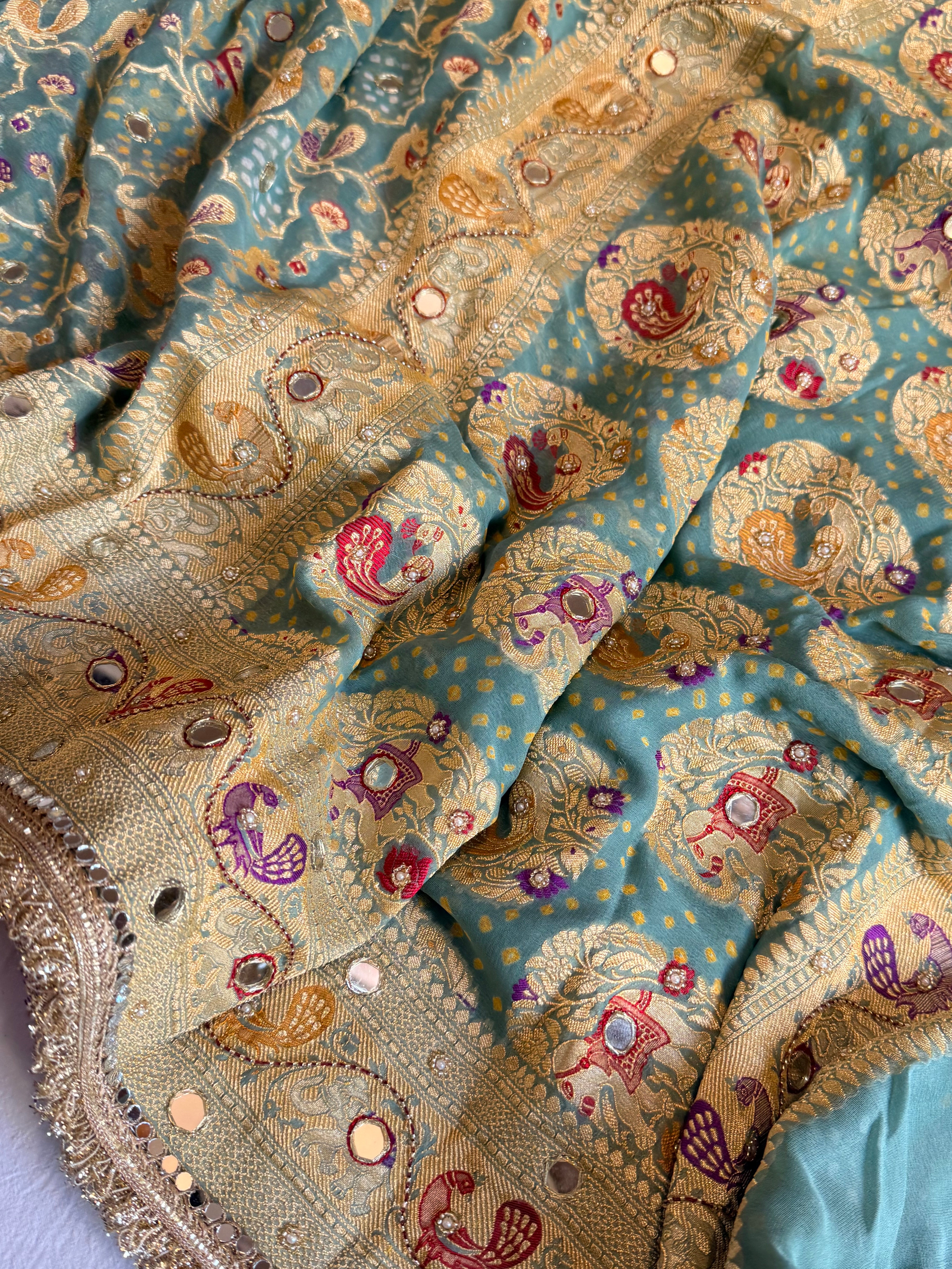 Banarasi blush shades of chiffon rai bandhej mirror work hand embroidered saree