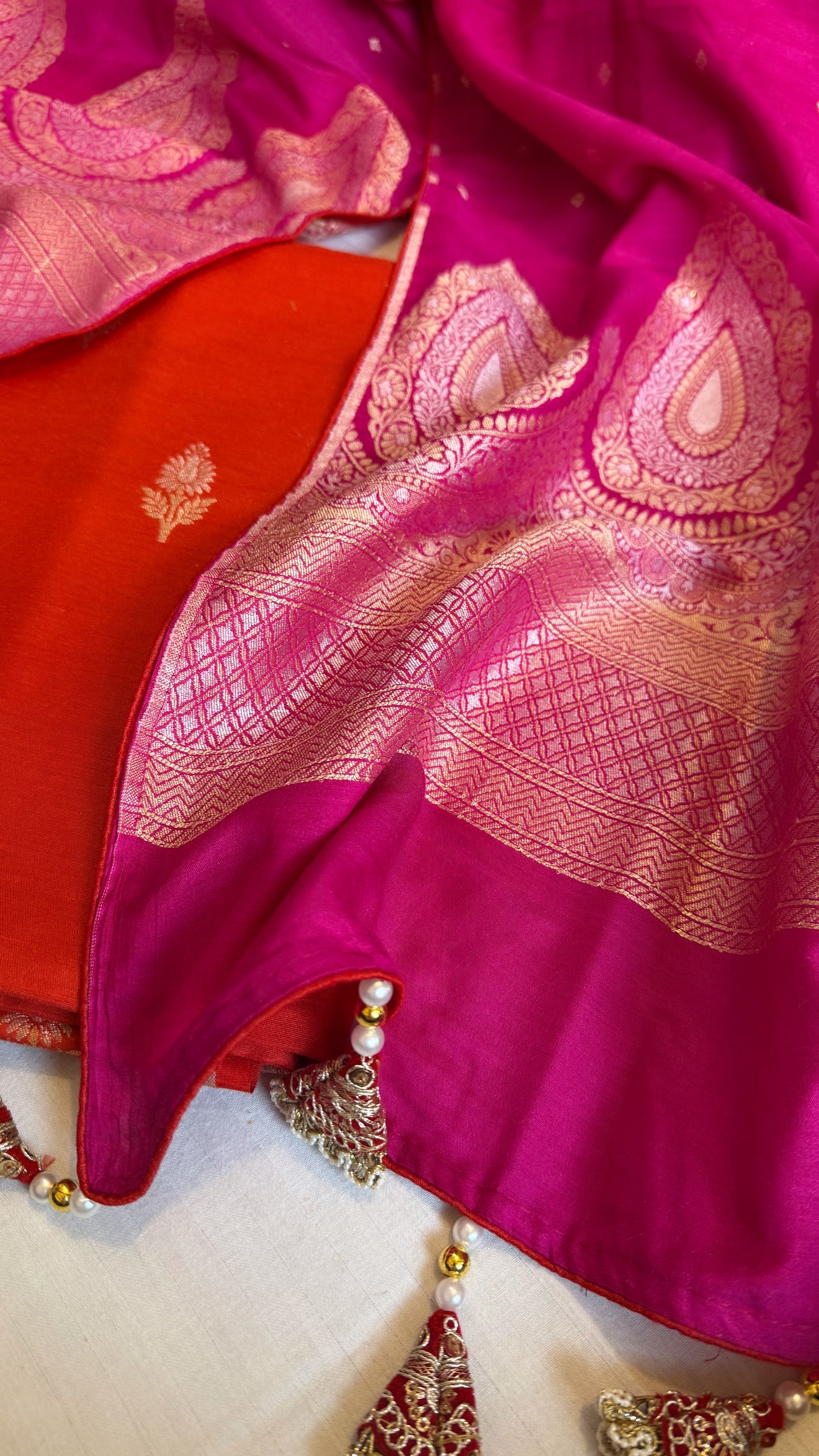 Moonga silk fanta orange - hot pink kadhwa suit set with latkans