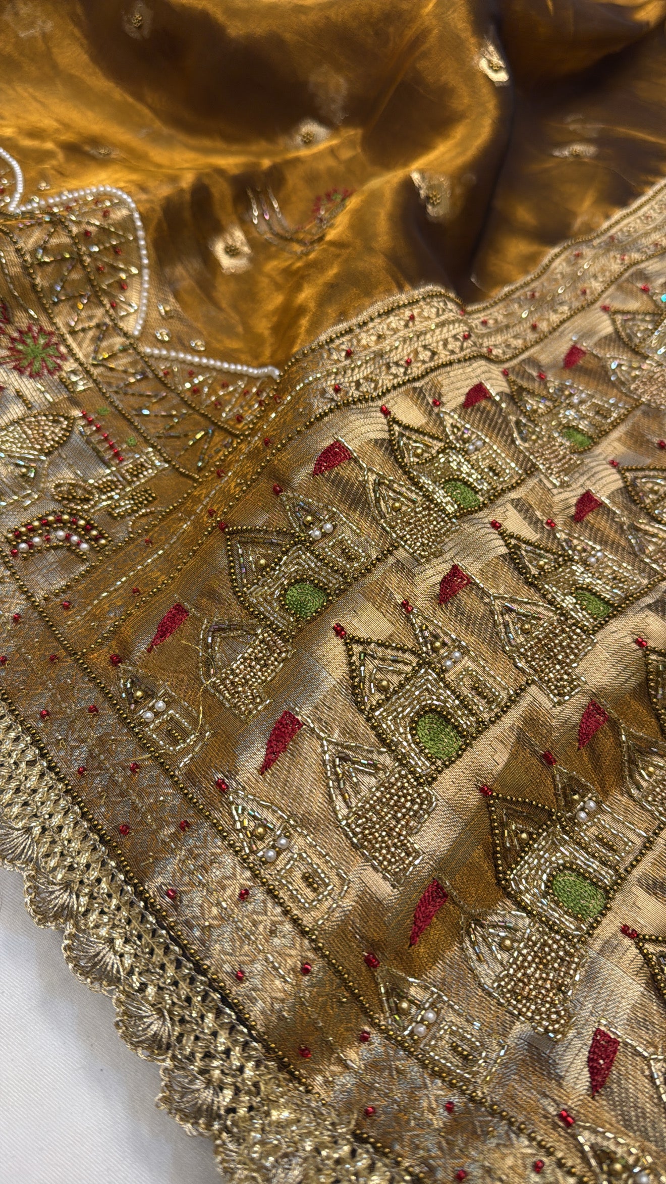 Gangakinare edit molten gold tissue silk hand embroidered saree