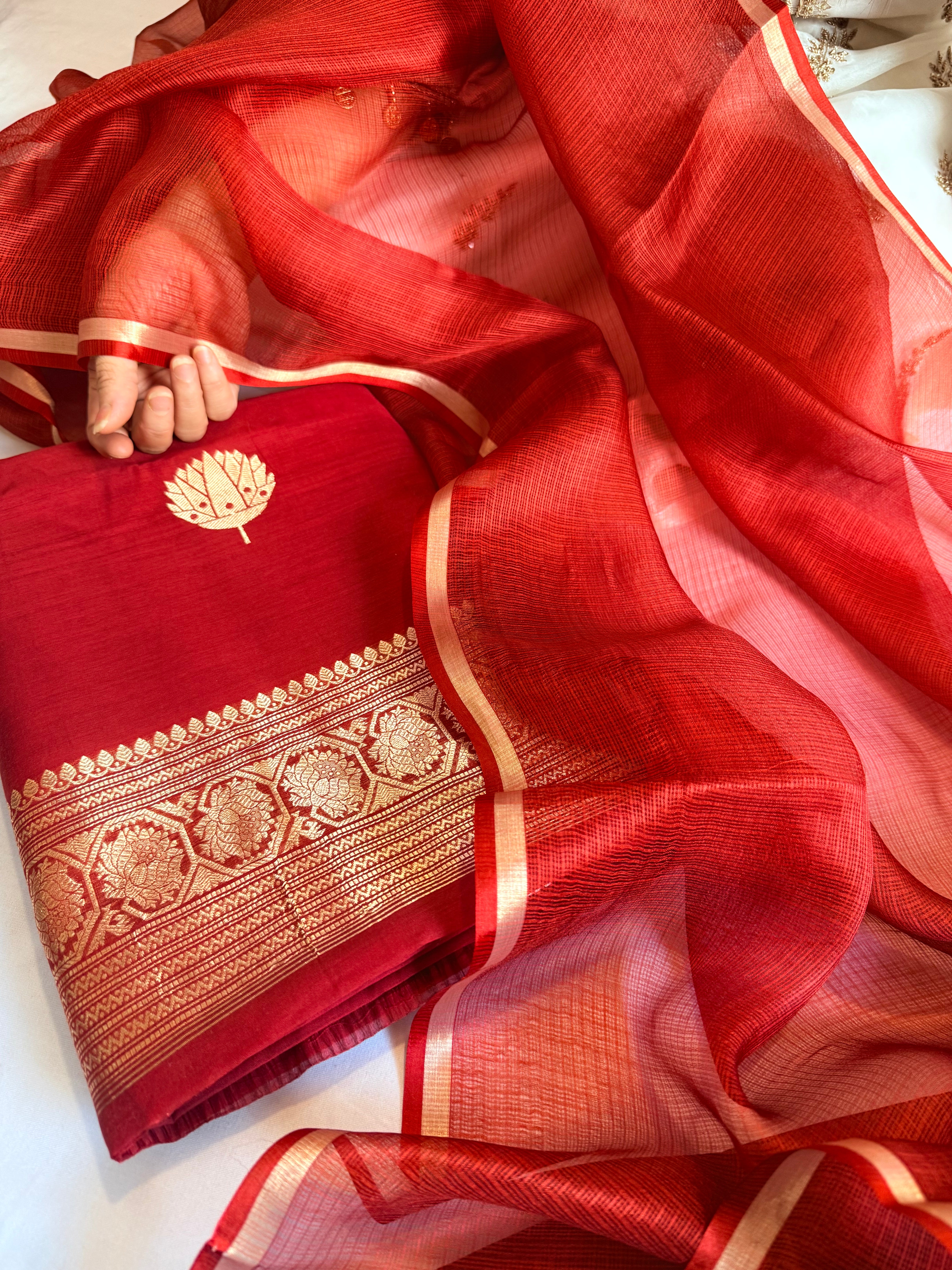 Blood red mul cotton kadhwa buti kurta paired with kora silk net duppata set