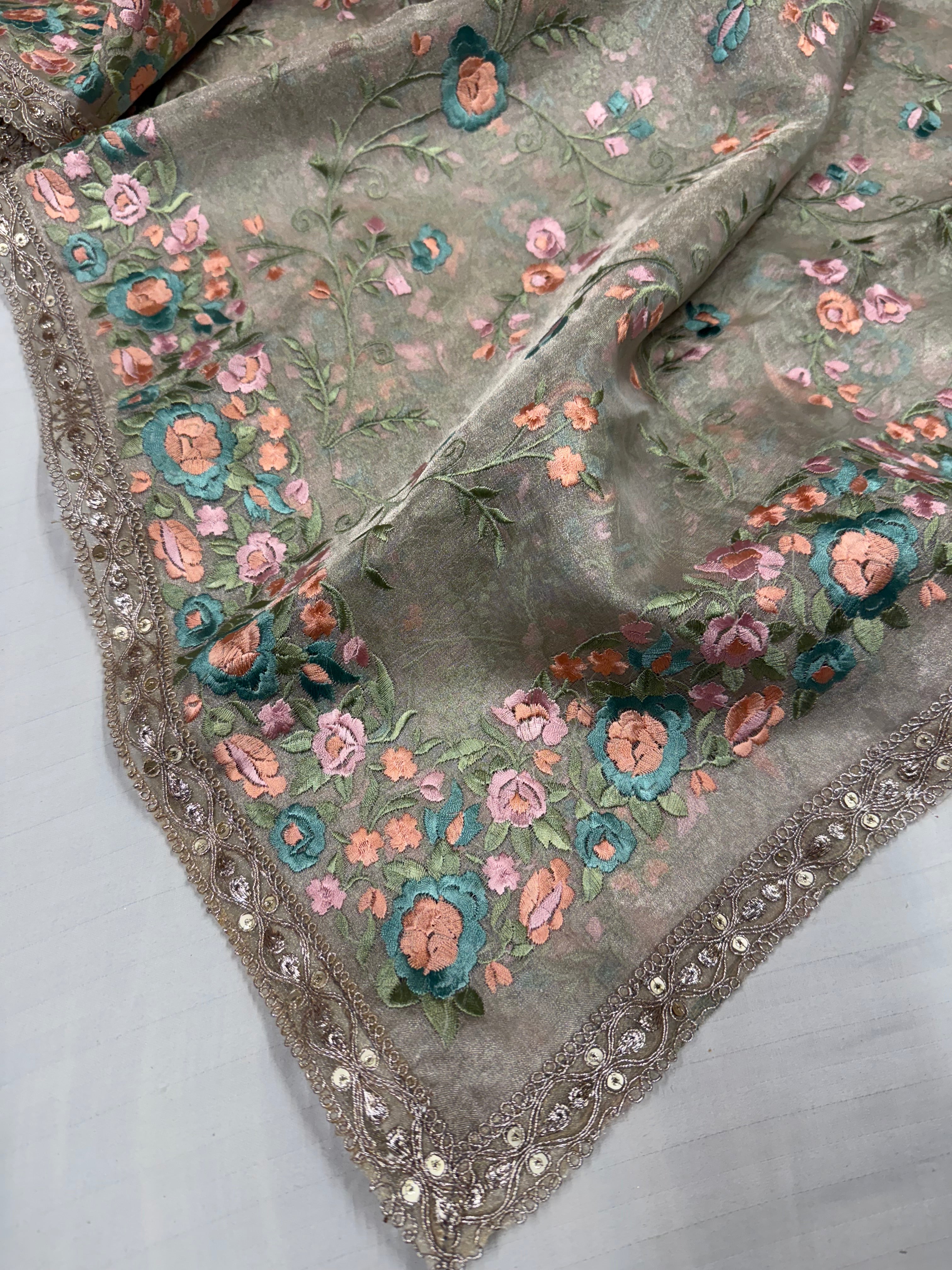 “Parsi gara” inspired tissue silk heavy resham work hand embroidered saree