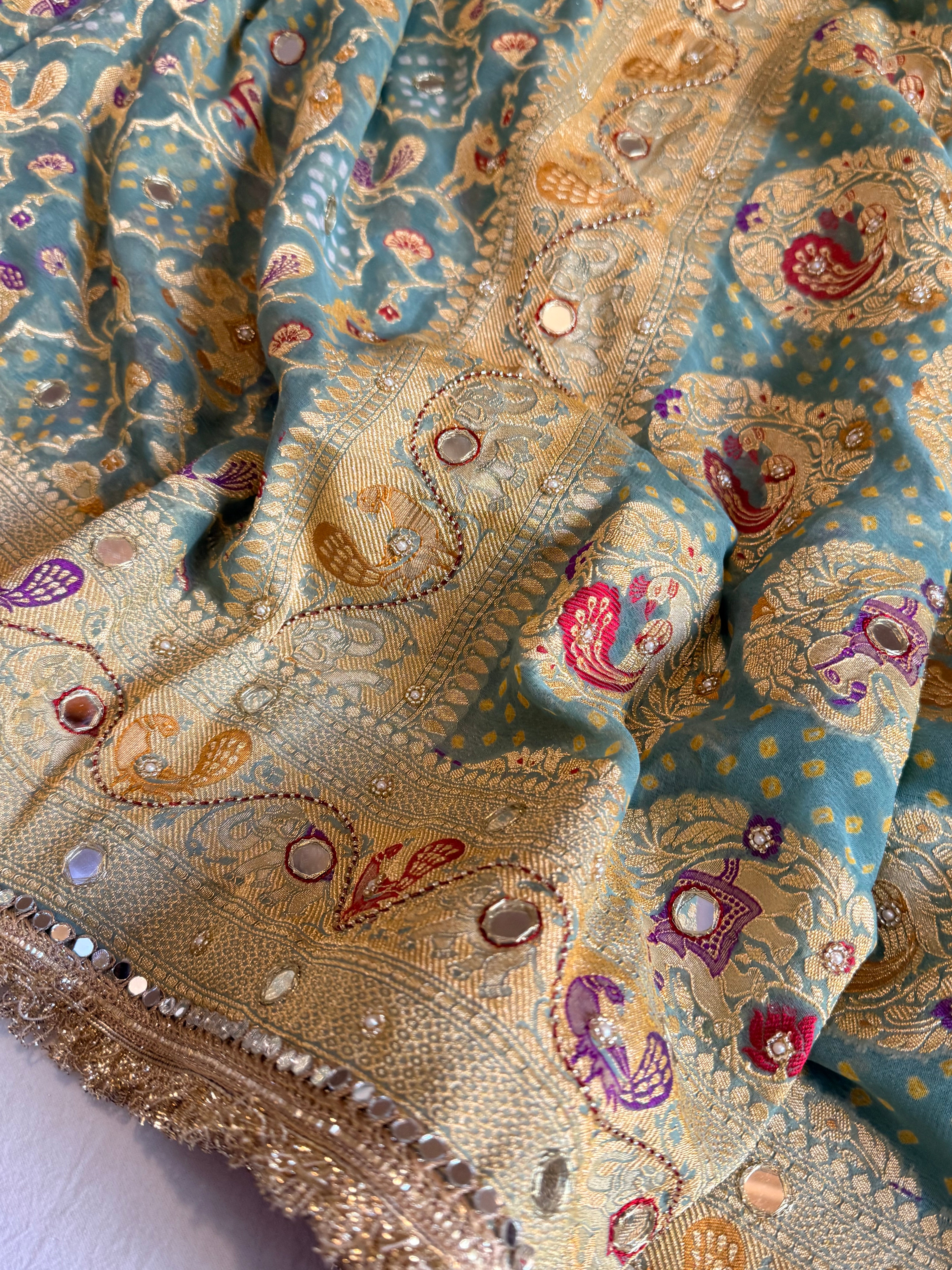 Banarasi blush shades of chiffon rai bandhej mirror work hand embroidered saree