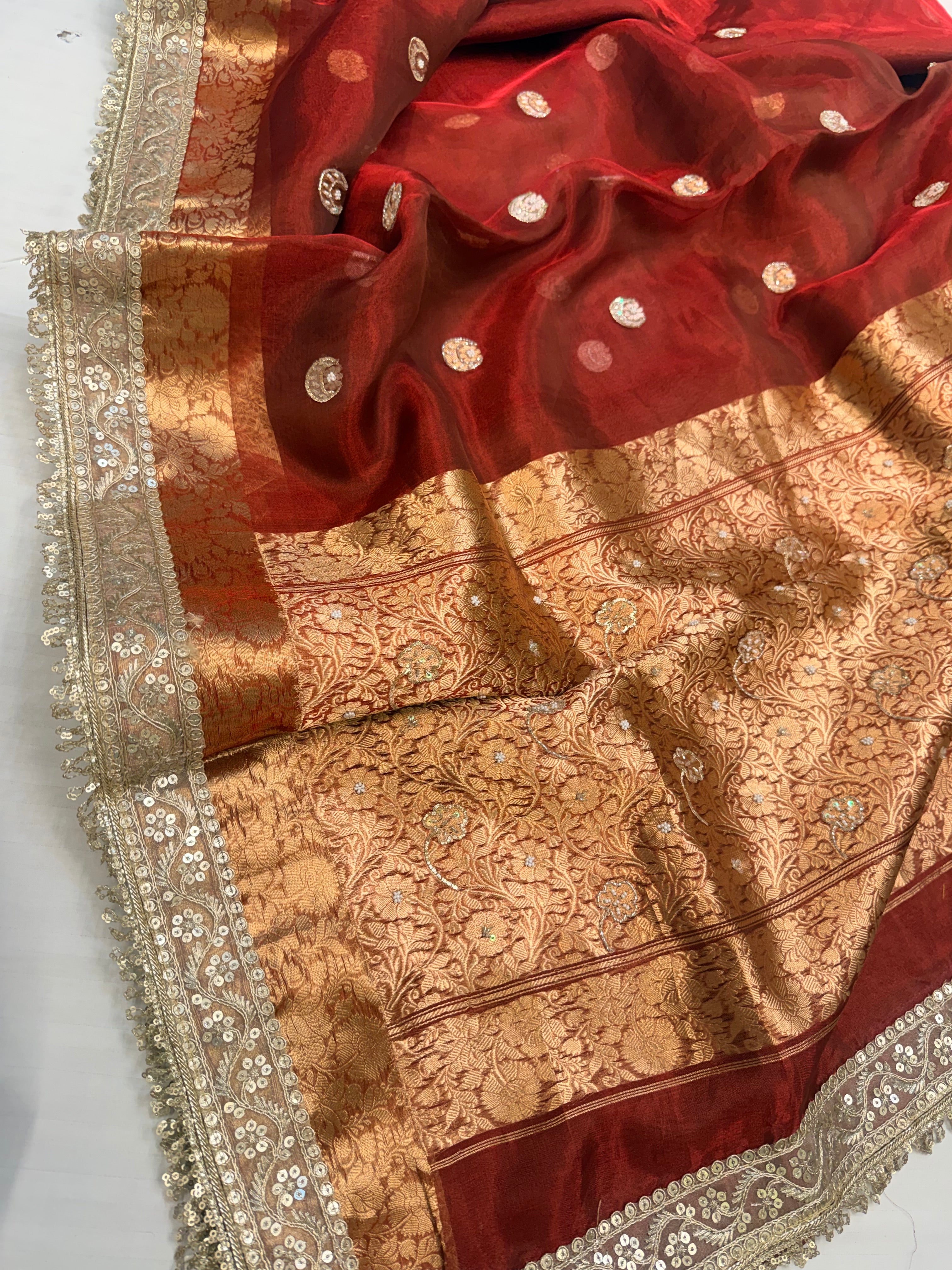 Metallic blood red chand buta tissue silk hand embroidered saree