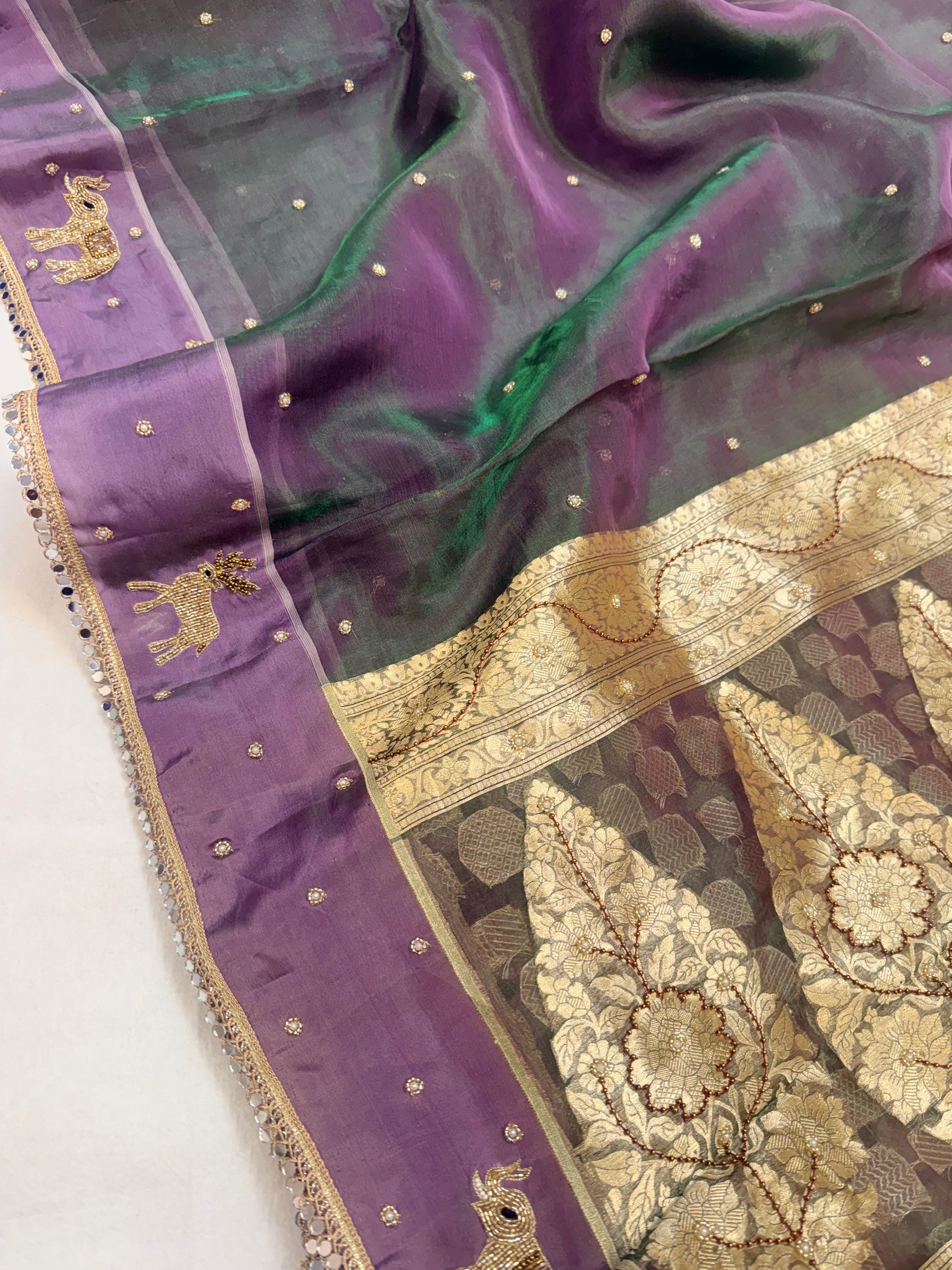 Midnight purple-green dhup chao effect tissue silk hand embroidered saree