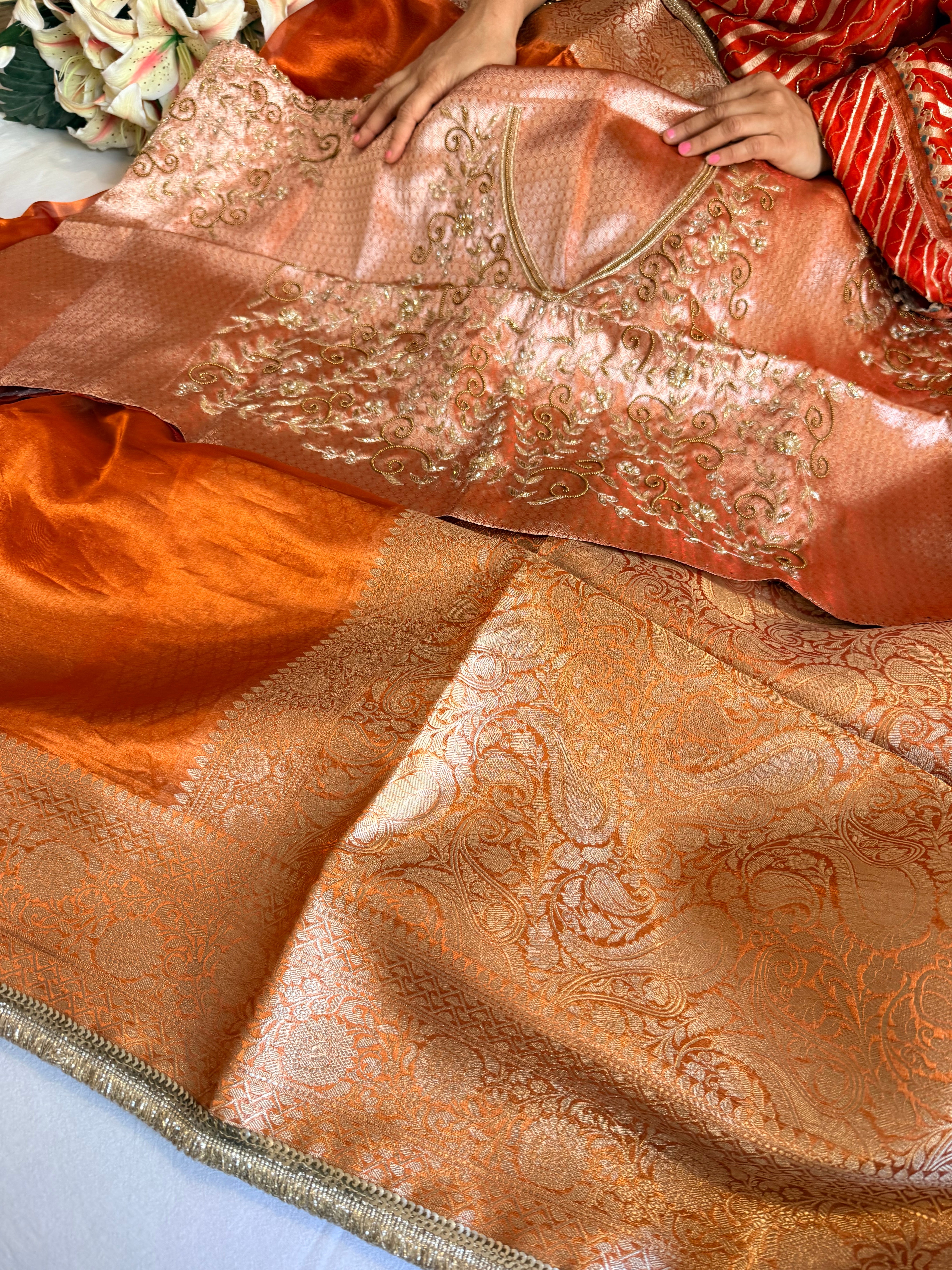Metallic orange husn tissue silk hand embroidered saree with heavy blouse