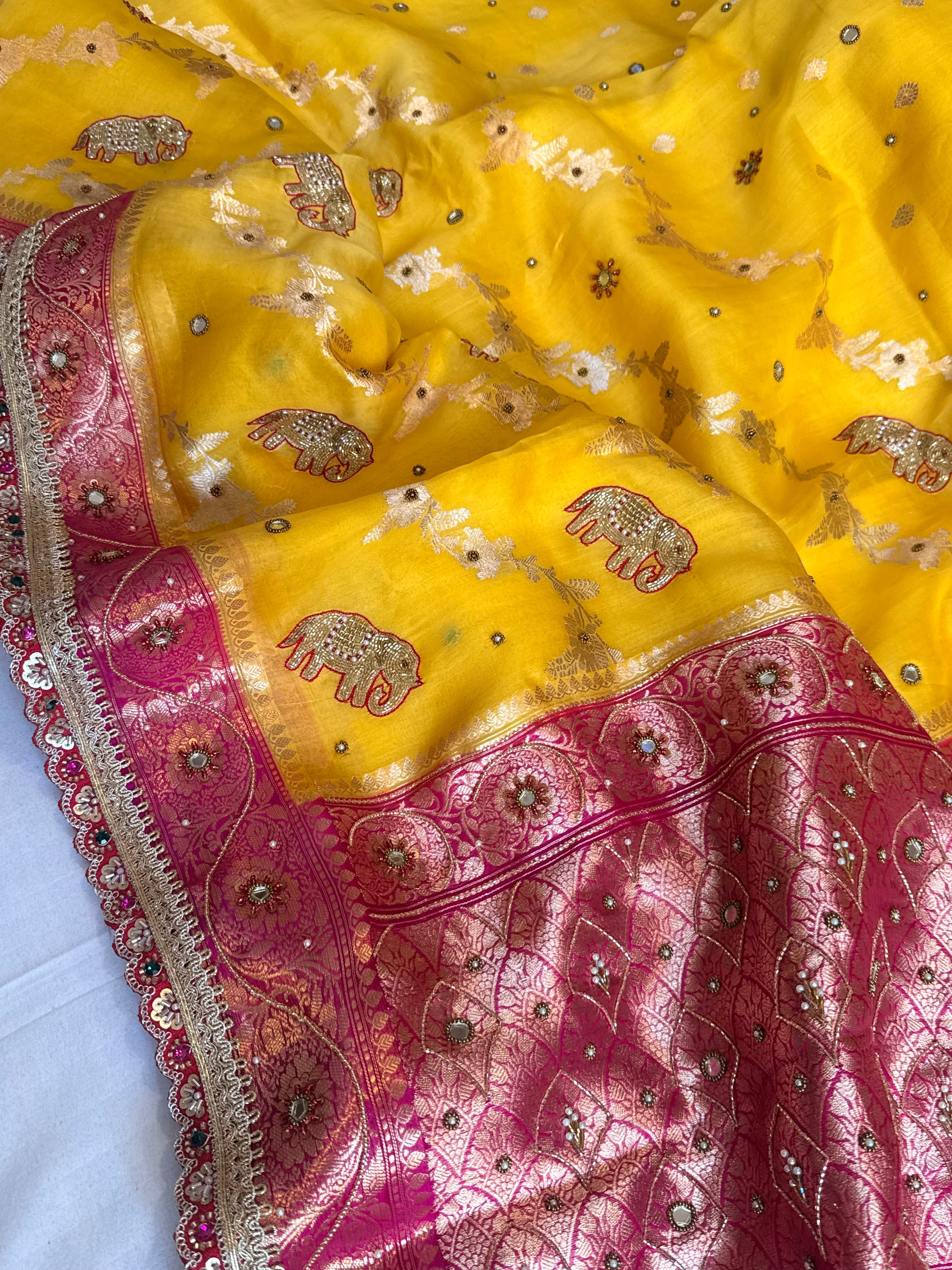 Peeli gulabi phere wali kora silk hand embroidered kadhwa saree