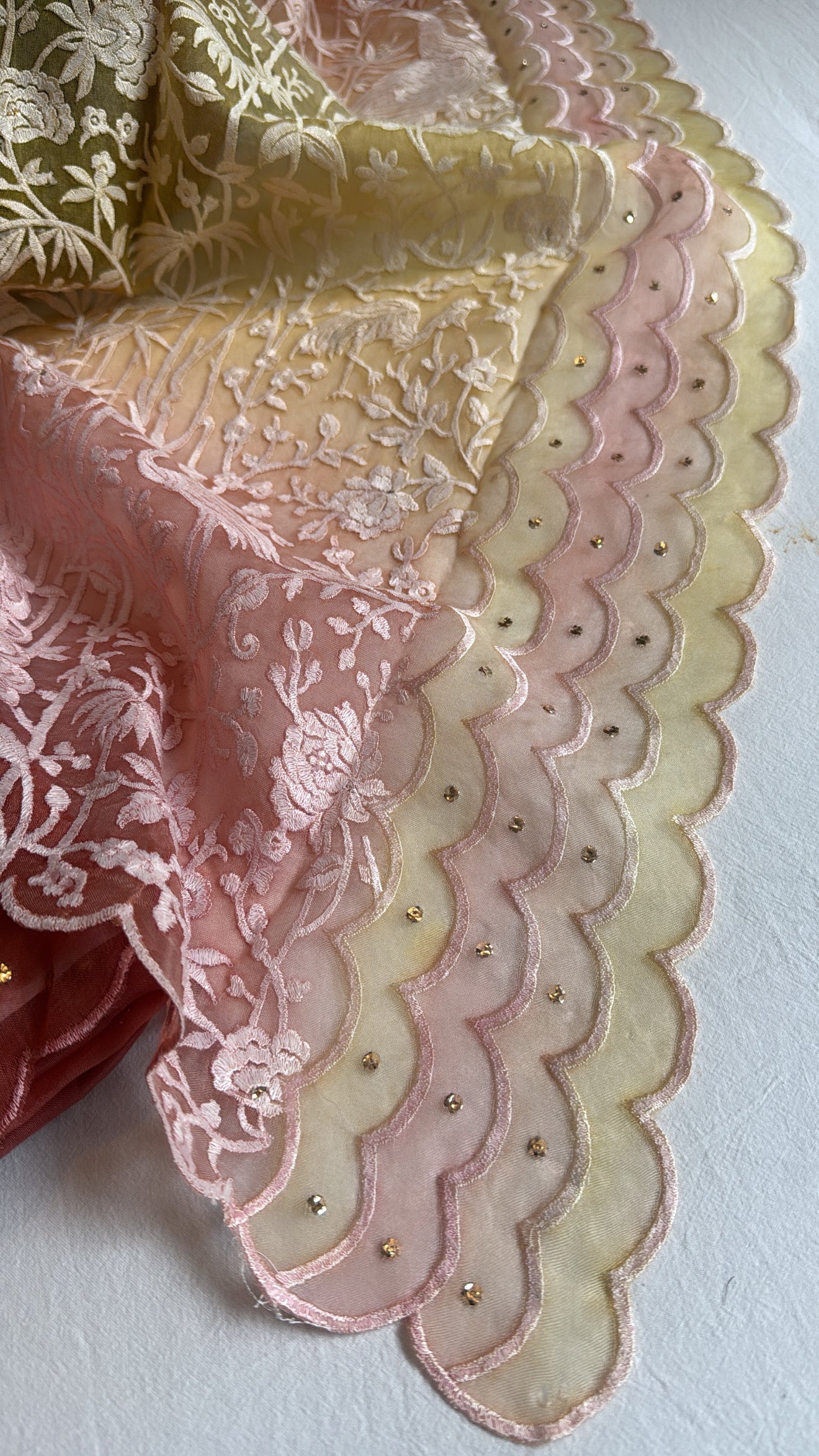 Shades of peach yellow - Parsi gara kora silk resham and mukaish work hand embroidered suits