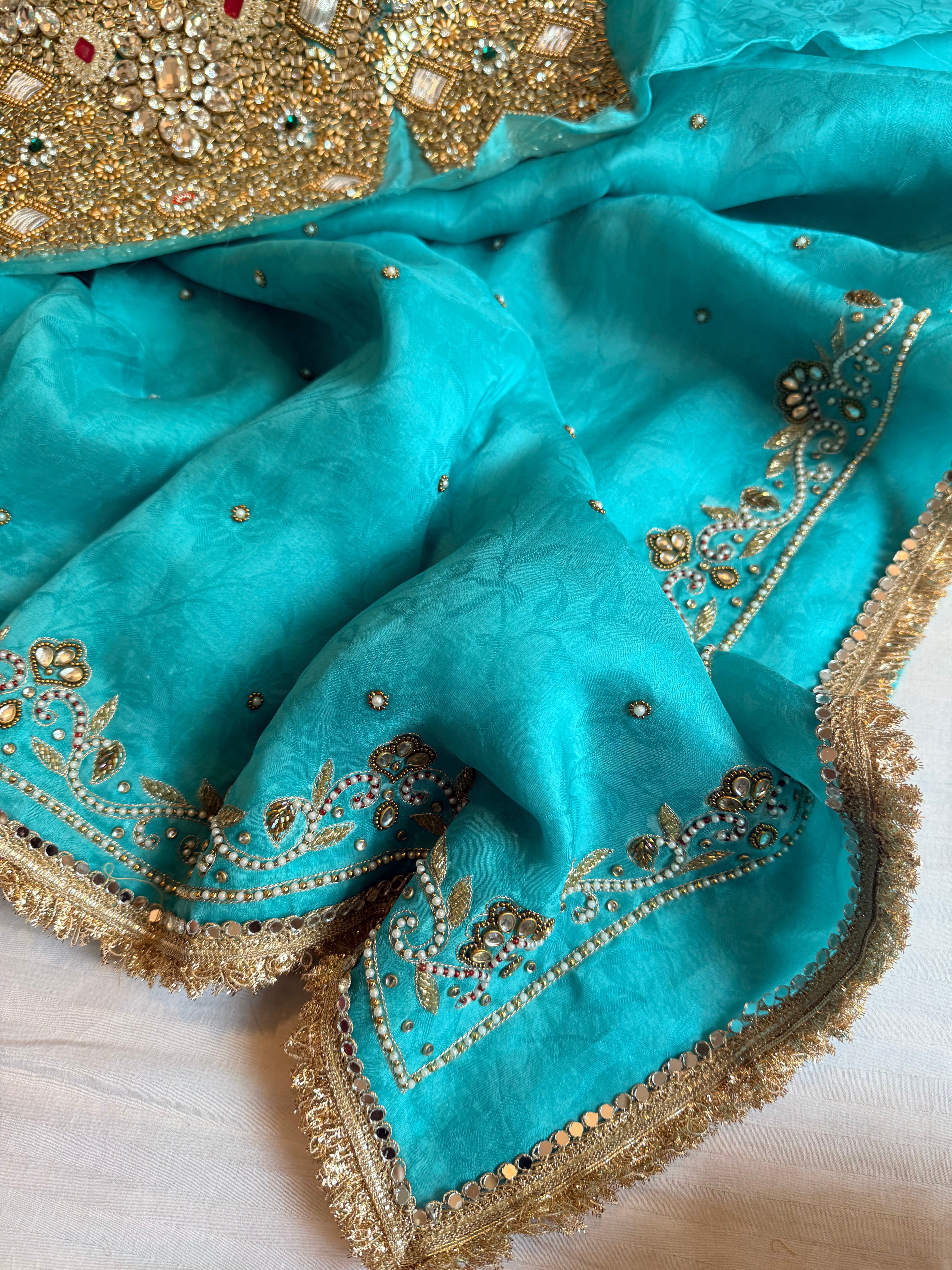 Jadauwork tissue tanchoi silk hand embroidered kadhwa saree
