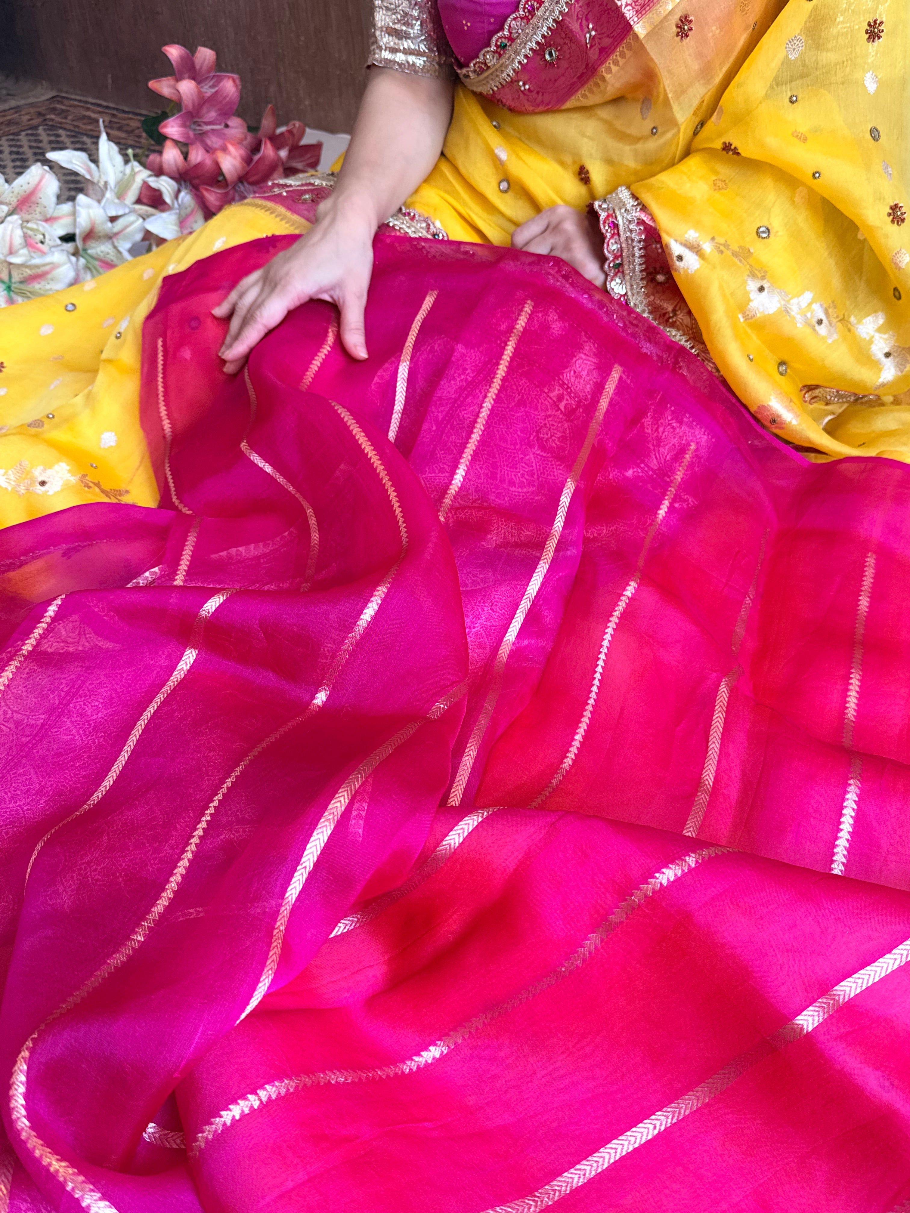 Peeli gulabi phere wali kora silk hand embroidered kadhwa saree