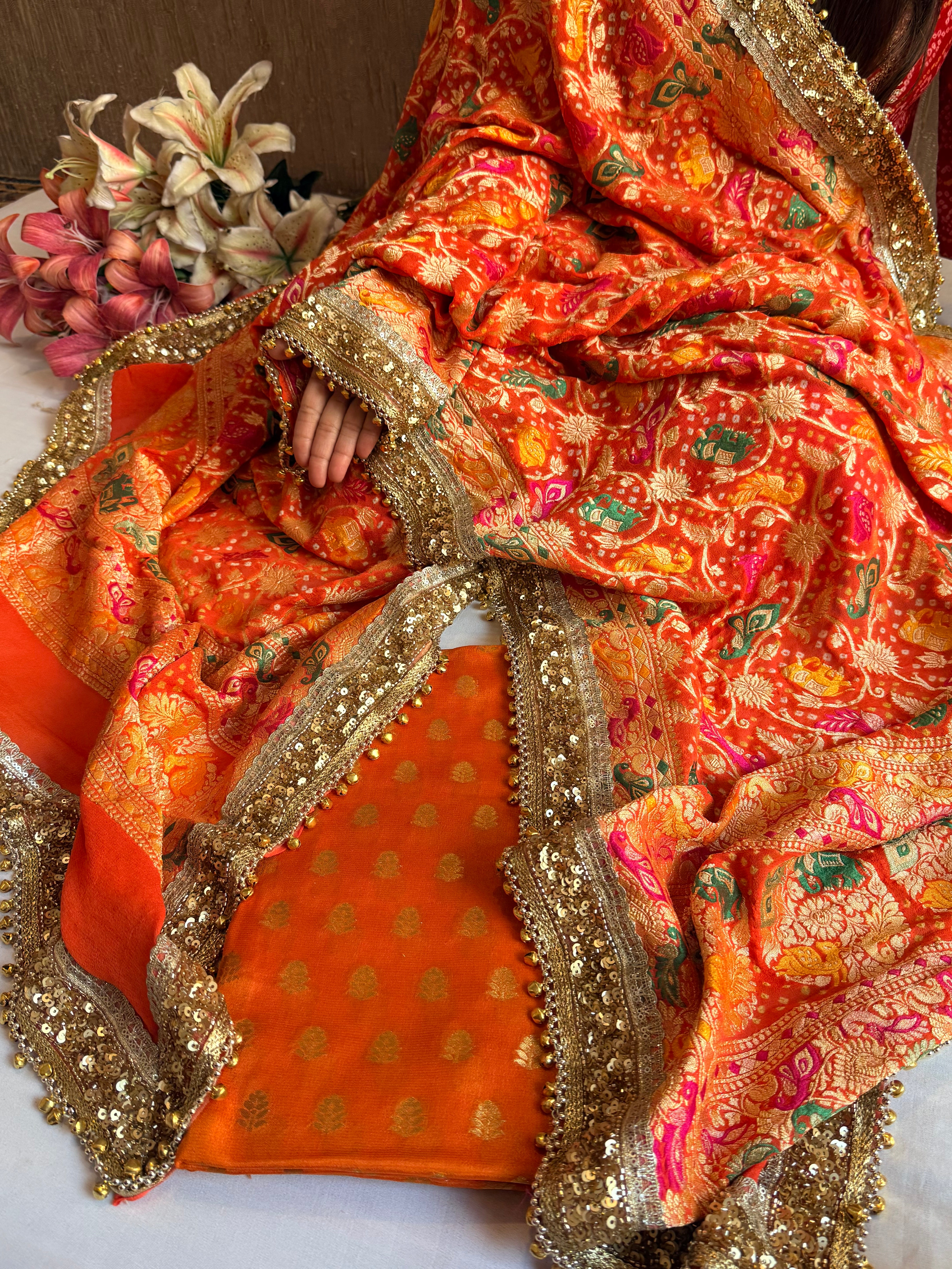 Banarasi bandhej fanta orange ghungroo and sequin work chiffon gorgette kadhwa suit set