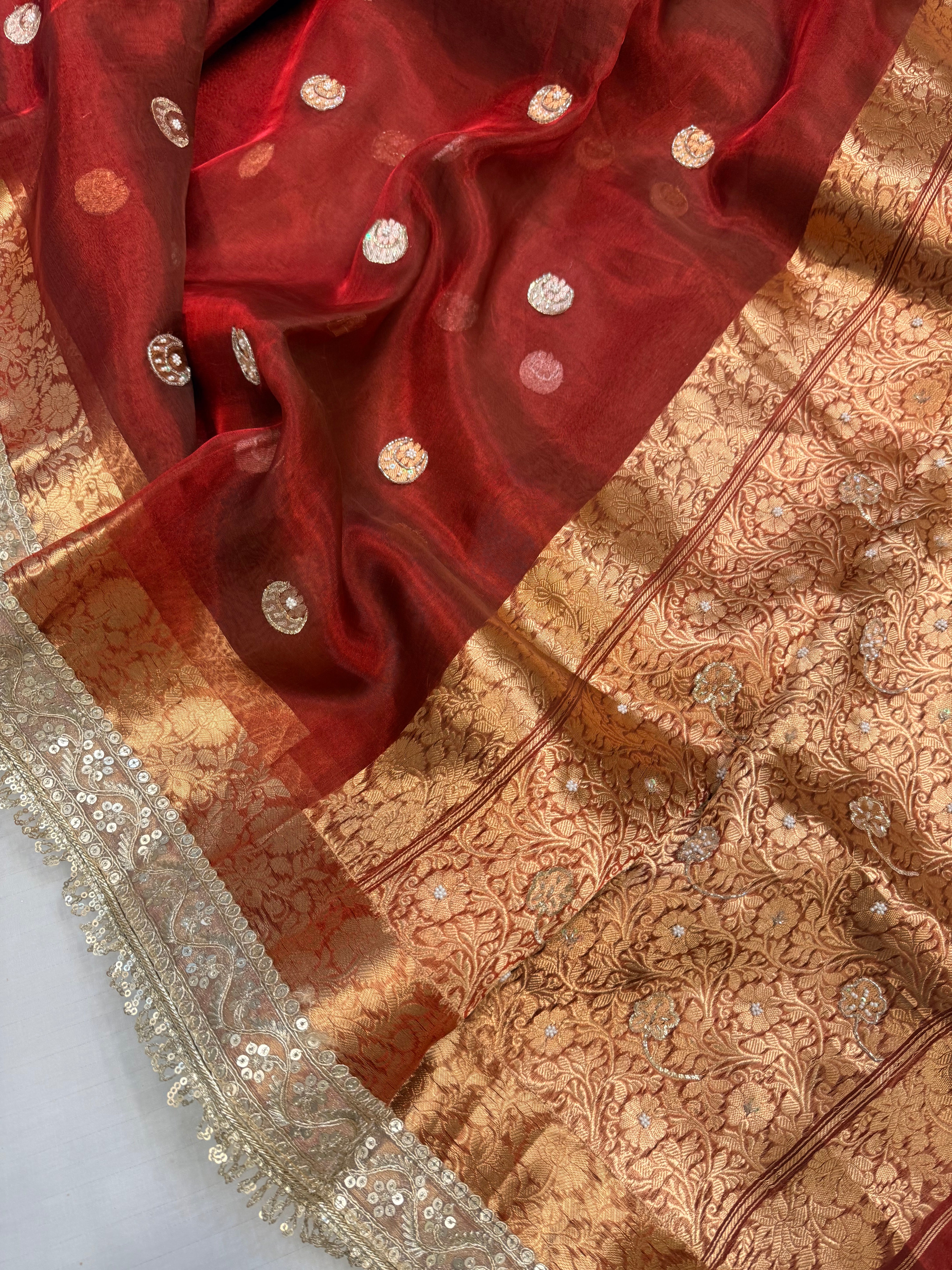 Metallic blood red chand buta tissue silk hand embroidered saree